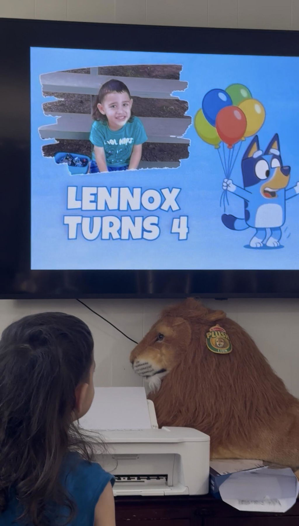 Personalized birthday video playing on a television