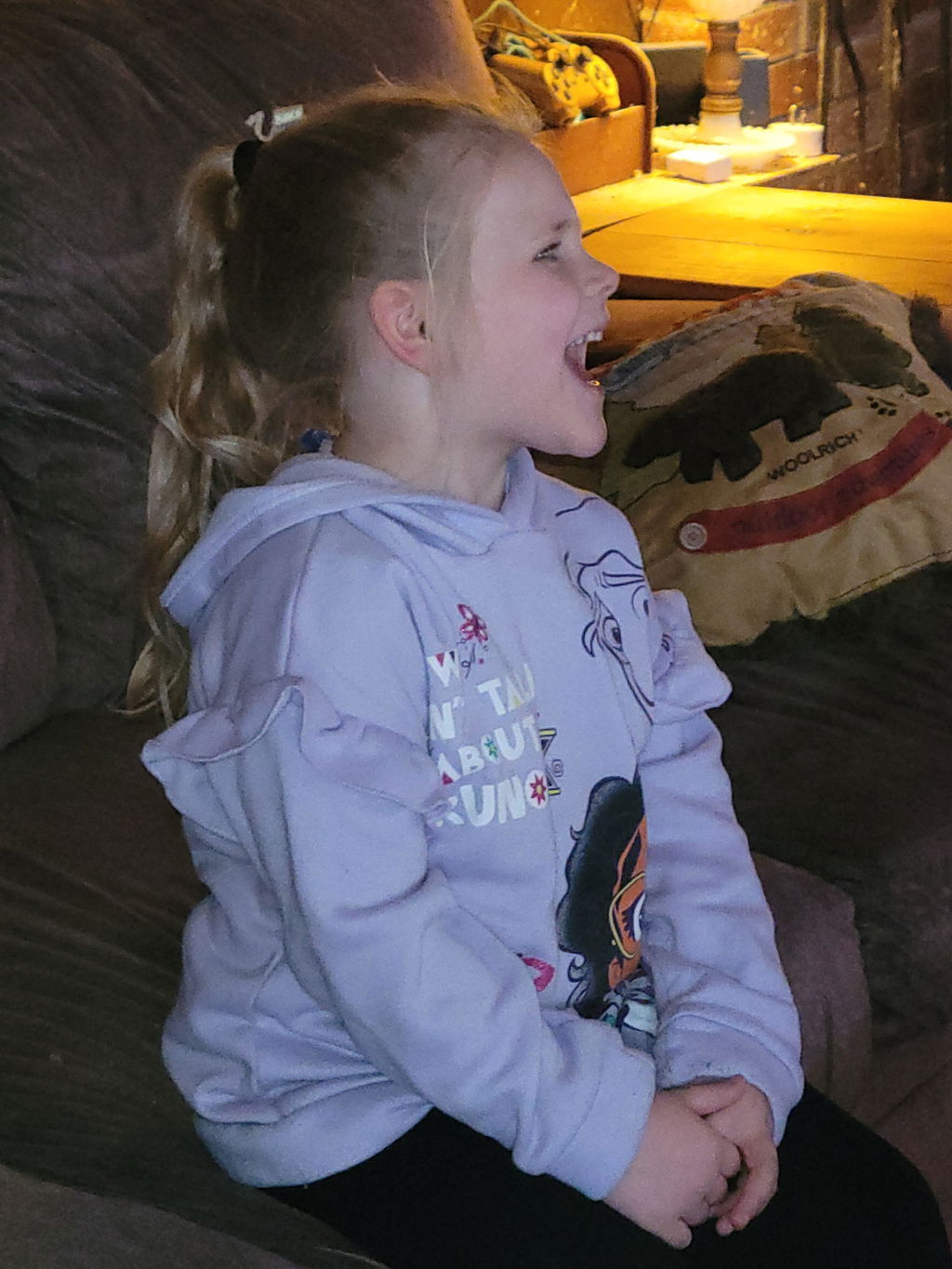 Happy child reacting to a personalized birthday video