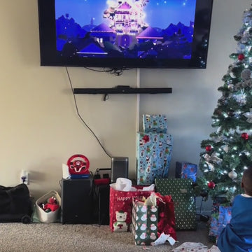 Caylan Jr. watching a birthday video