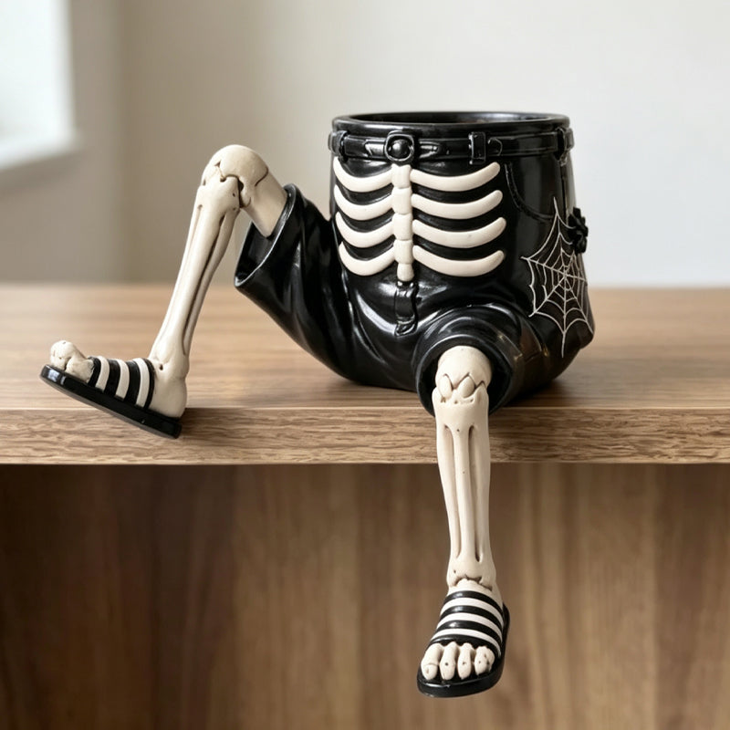 Halloween-Blumentöpfe in Form von Figuren mit herunterhängenden Beinen