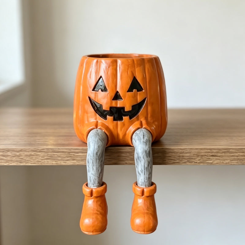 Halloween-Blumentöpfe in Form von Figuren mit herunterhängenden Beinen