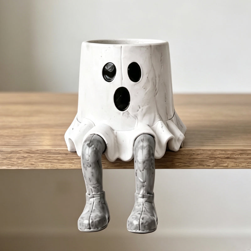Halloween-Blumentöpfe in Form von Figuren mit herunterhängenden Beinen
