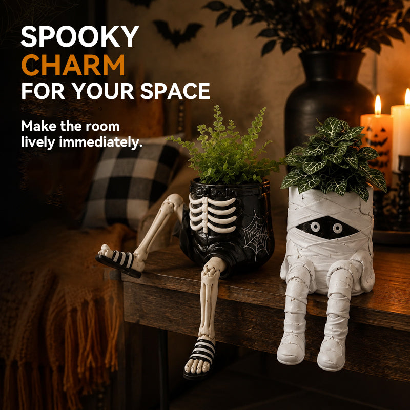 Halloween-Blumentöpfe in Form von Figuren mit herunterhängenden Beinen