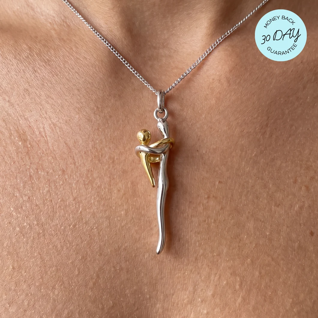 held - motherhood necklace