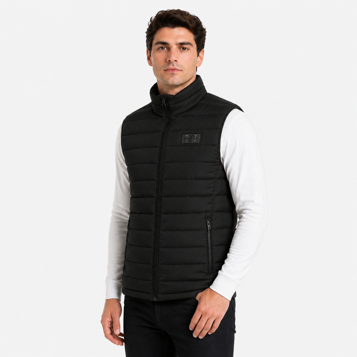 Three-quarter view of a male model wearing the black heated vest.