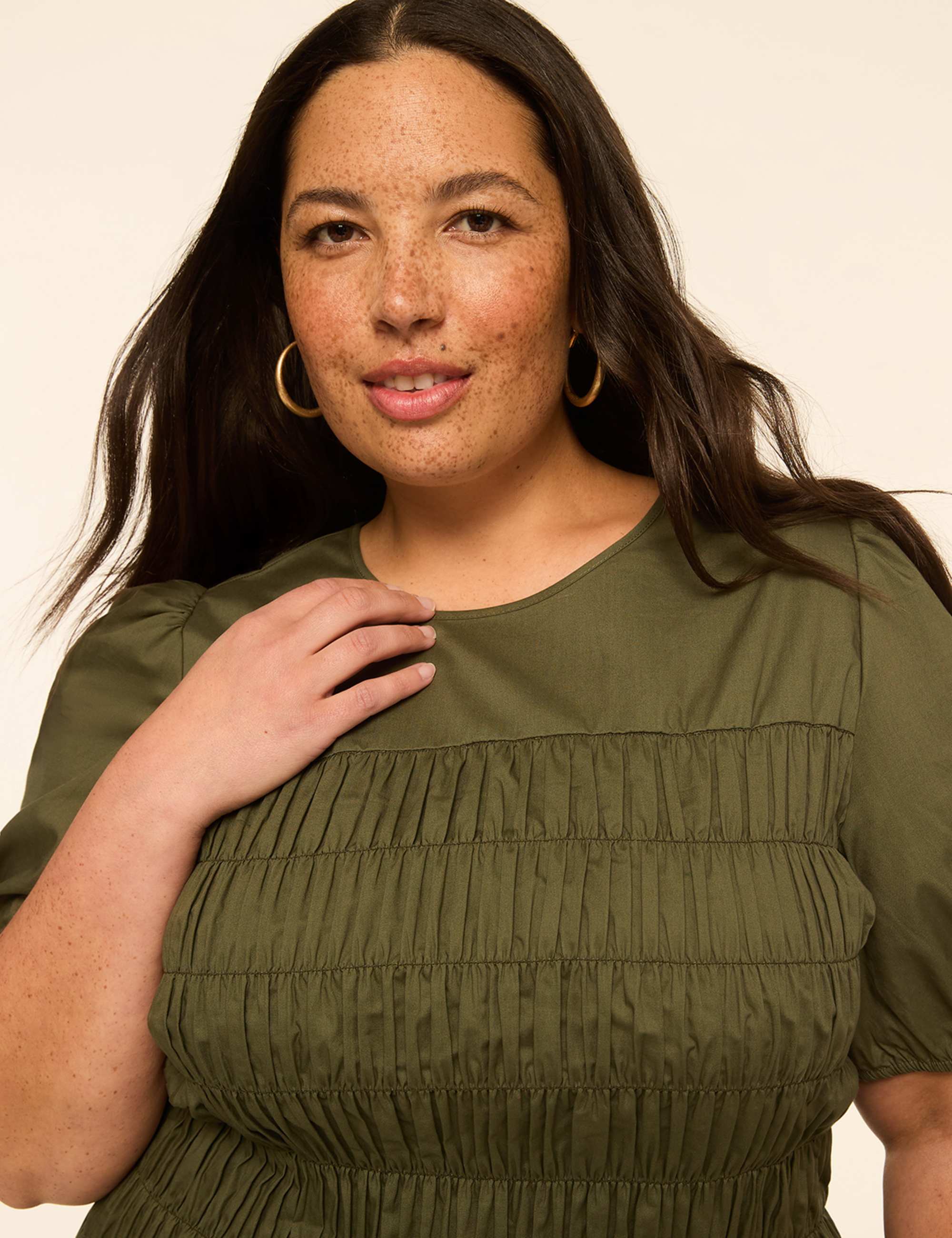 Puff-Sleeve Smocked Peplum Top