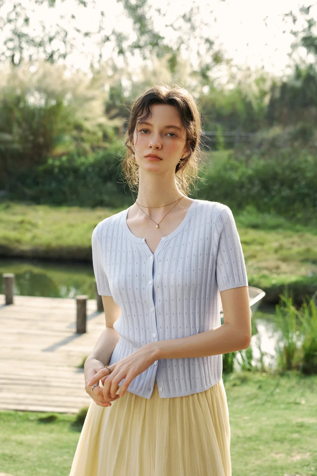 Light blue short-sleeved knit top