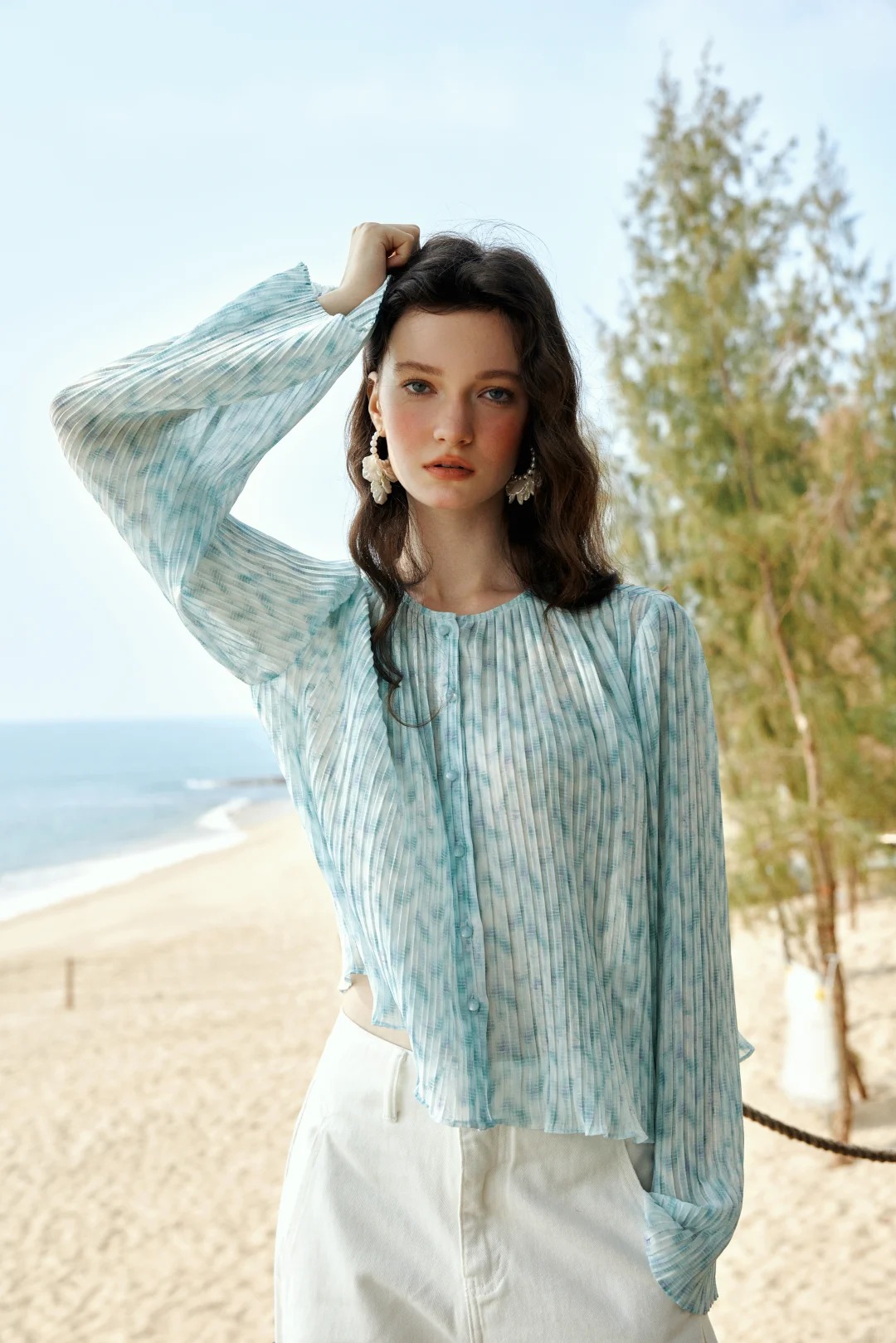 Light blue pleated chiffon top