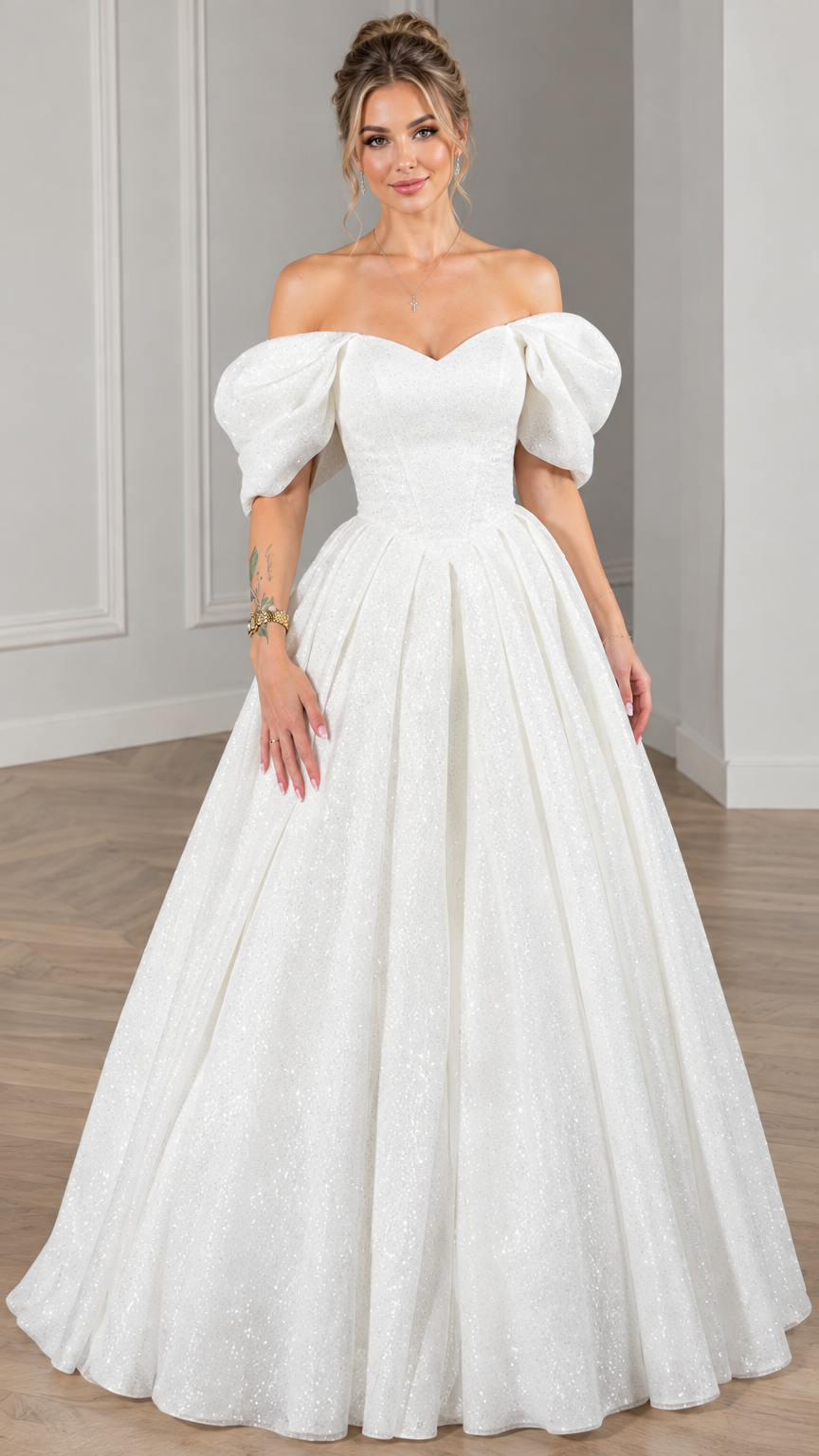 Front view of model wearing white glitter off-the-shoulder ball gown with puff sleeves