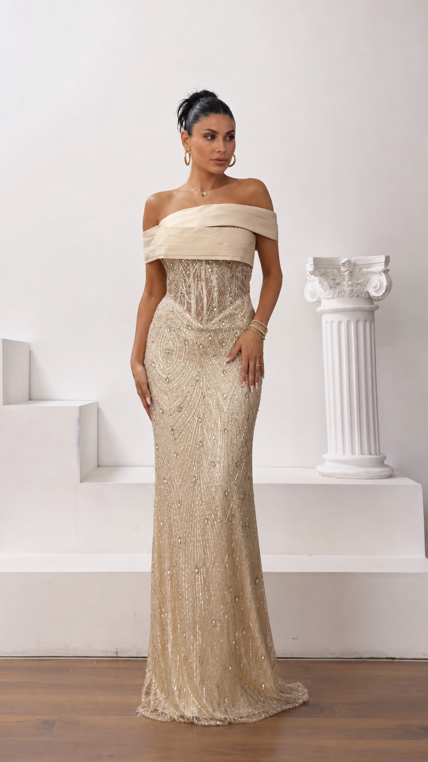 Front full-length view of model wearing champagne gold off-the-shoulder beaded corset evening gown