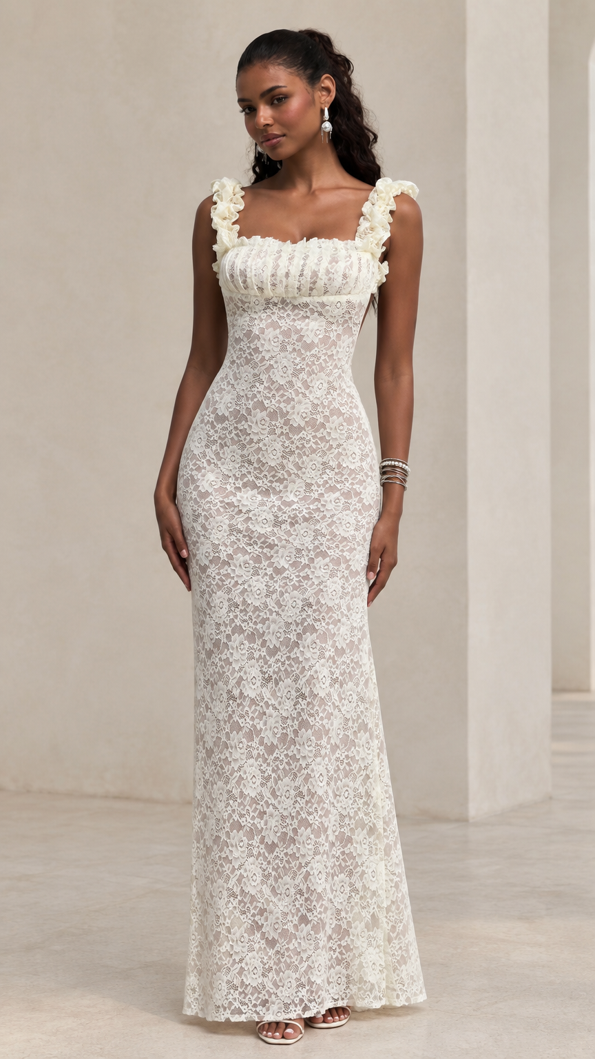 White floral lace sleeveless maxi dress with ruffled straps and column silhouette on model front view