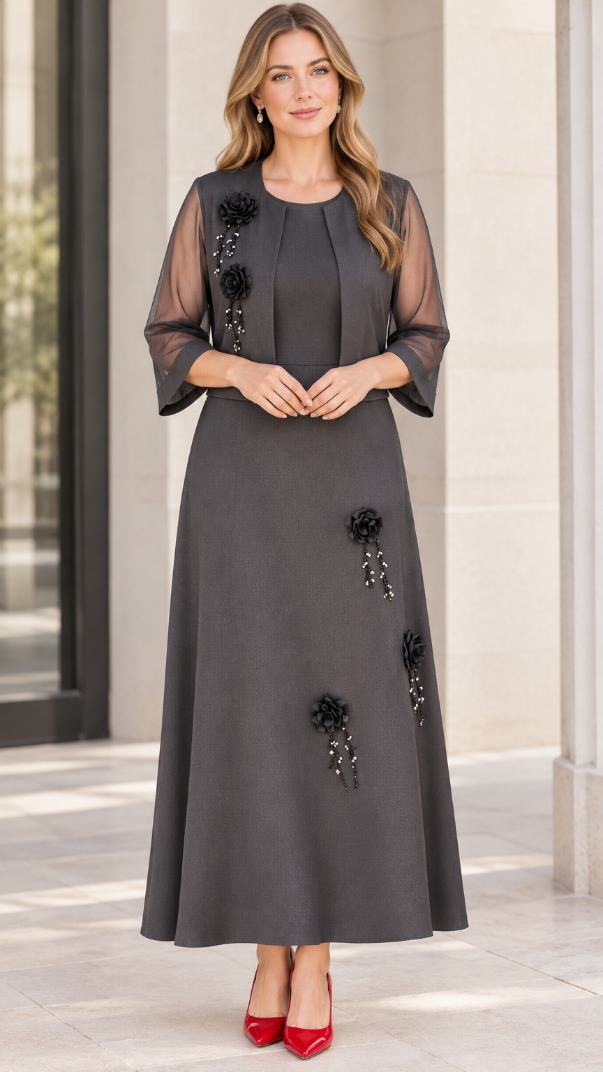 Charcoal grey two-piece formal dress set with cropped bolero jacket and floral appliques front view