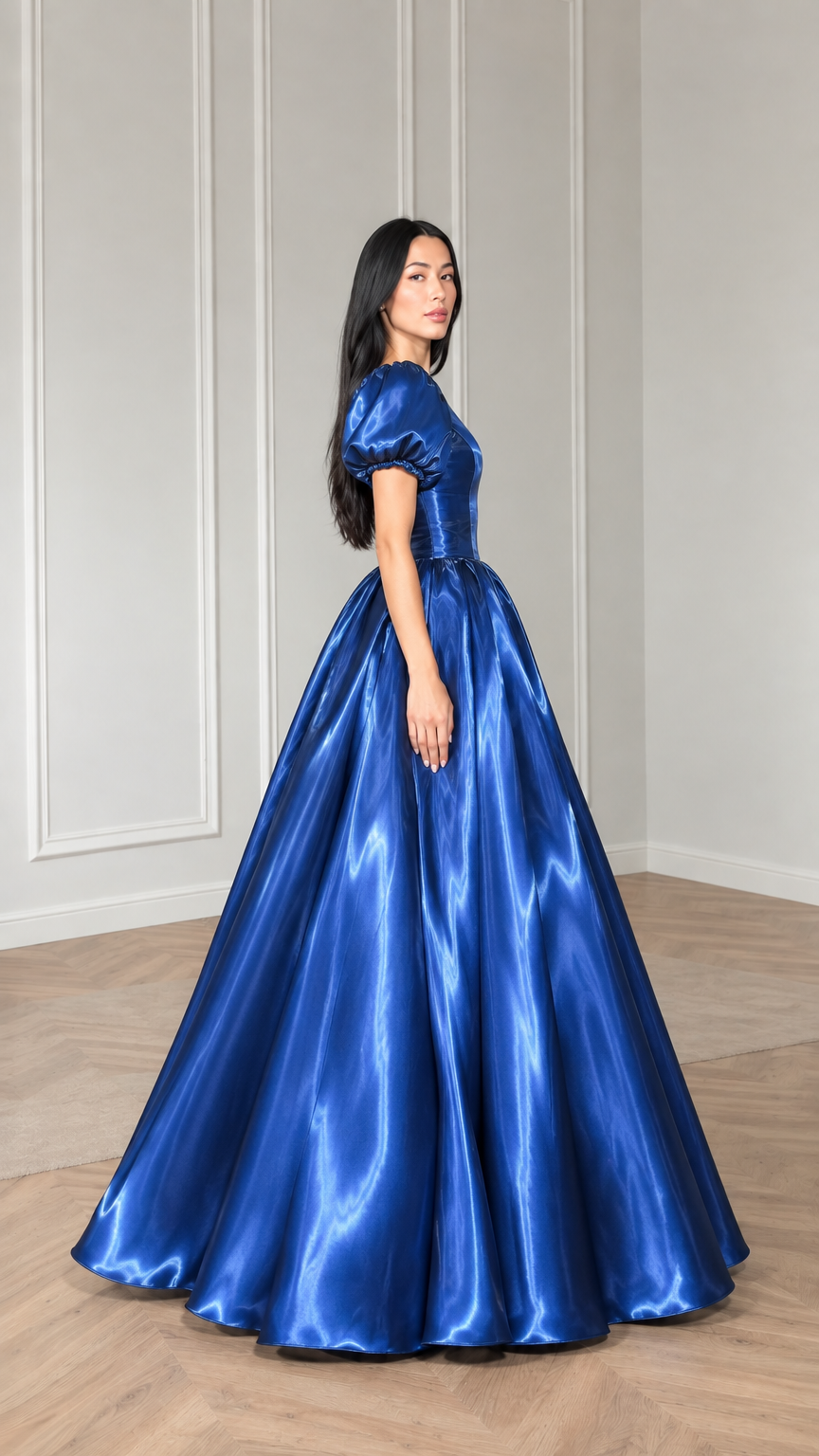 Side profile view of royal blue satin evening gown showing skirt volume