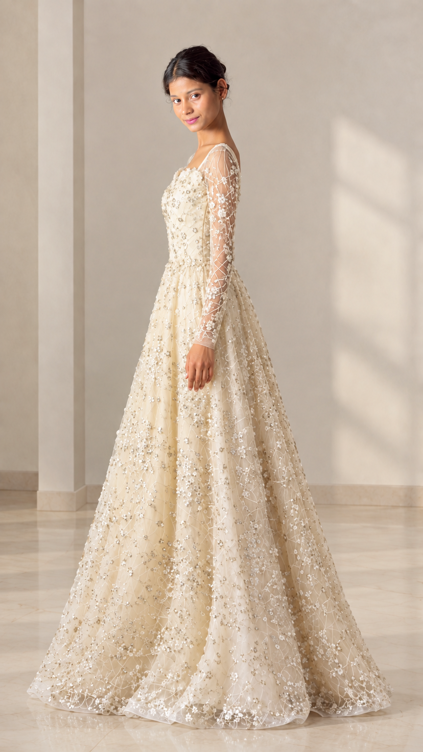 Champagne embellished long sleeve evening gown side profile