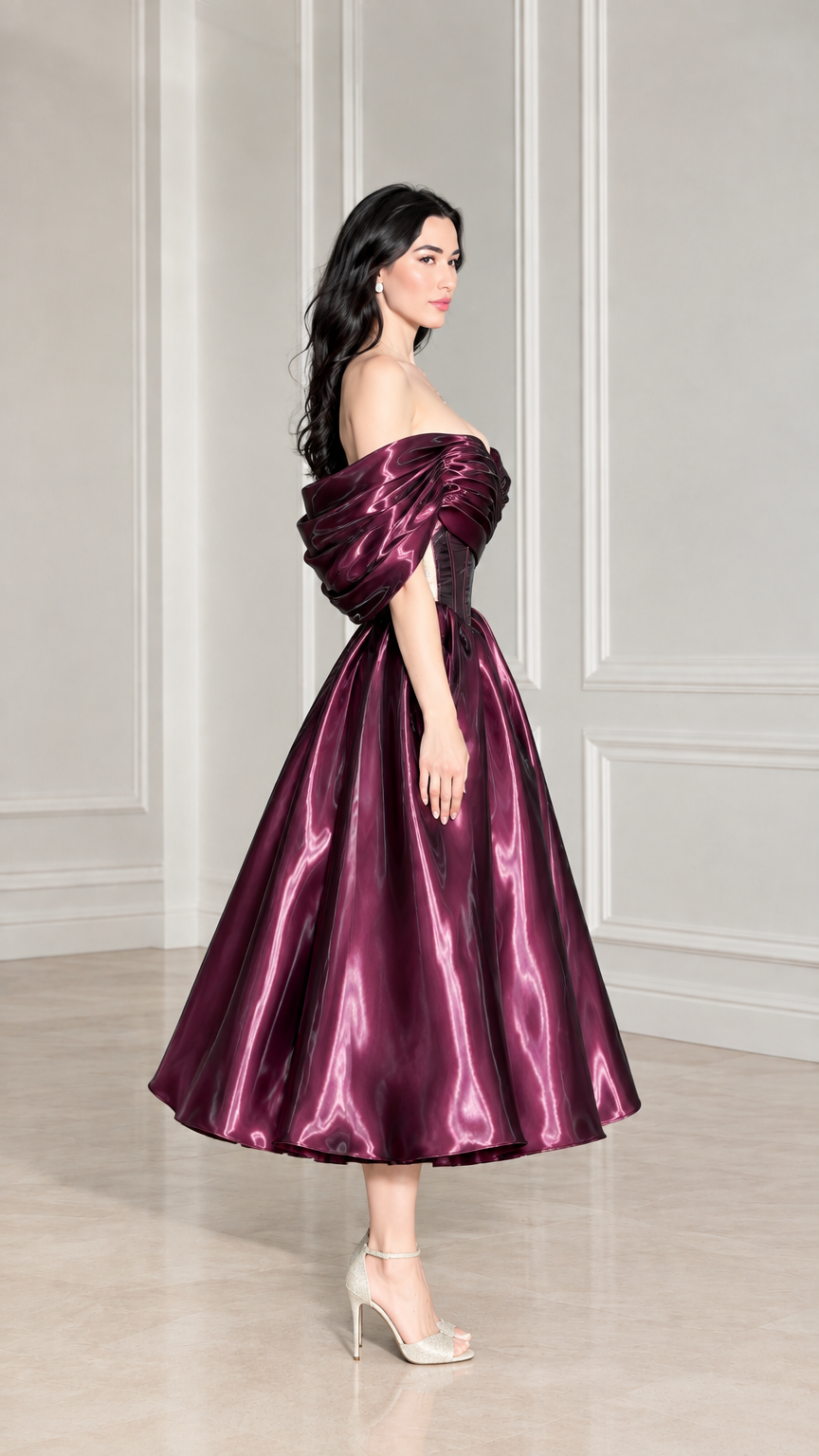 Side profile view of wine red off-shoulder pleated satin cocktail dress