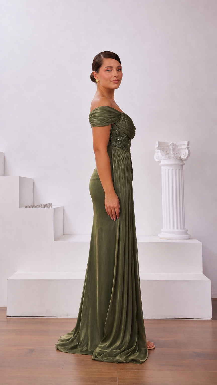 Side profile view of olive green draped formal maxi dress