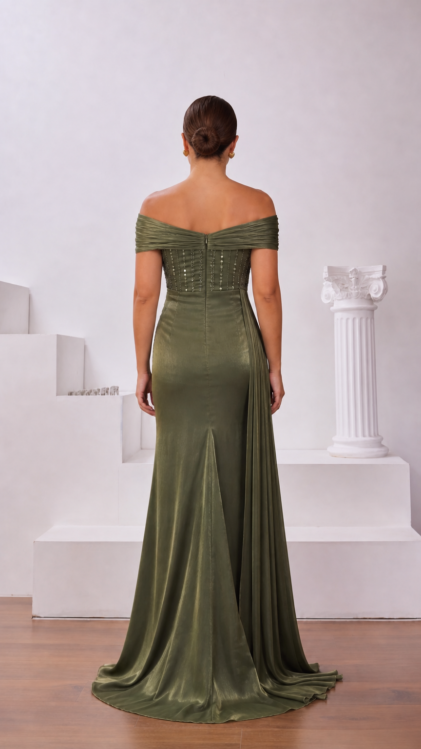 Back view of olive green off-shoulder evening gown showing structured fit and subtle train