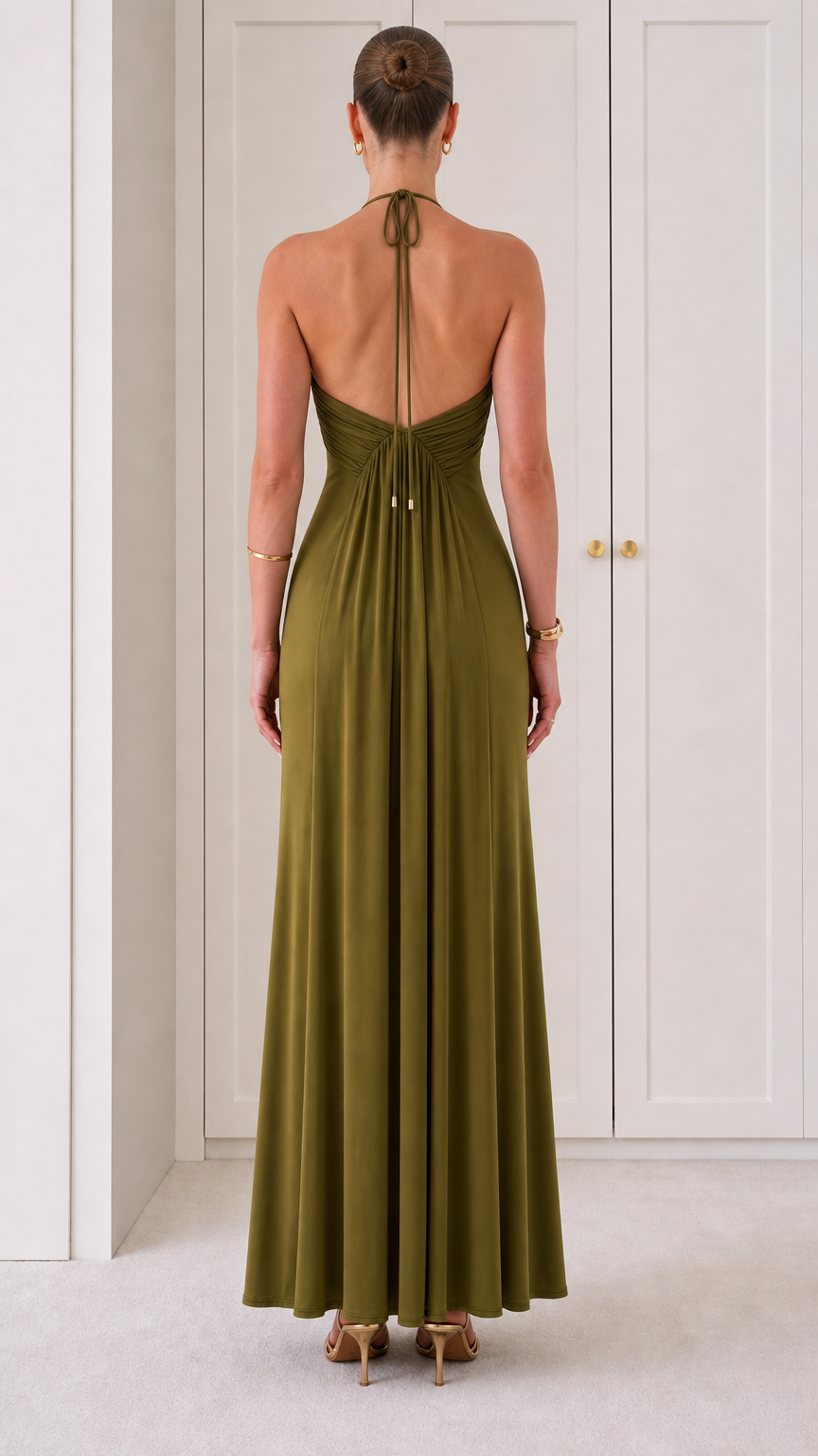Back view showing low back and gathered details on Olive Green halter dress