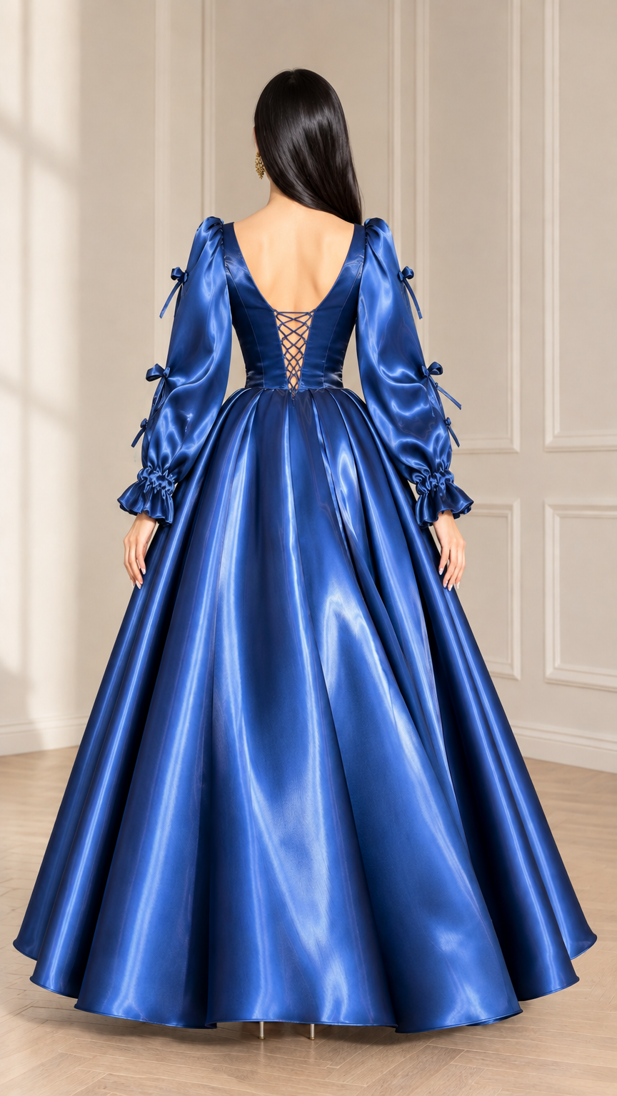 Back view of royal blue satin evening gown showing lace-up corset detail and full skirt