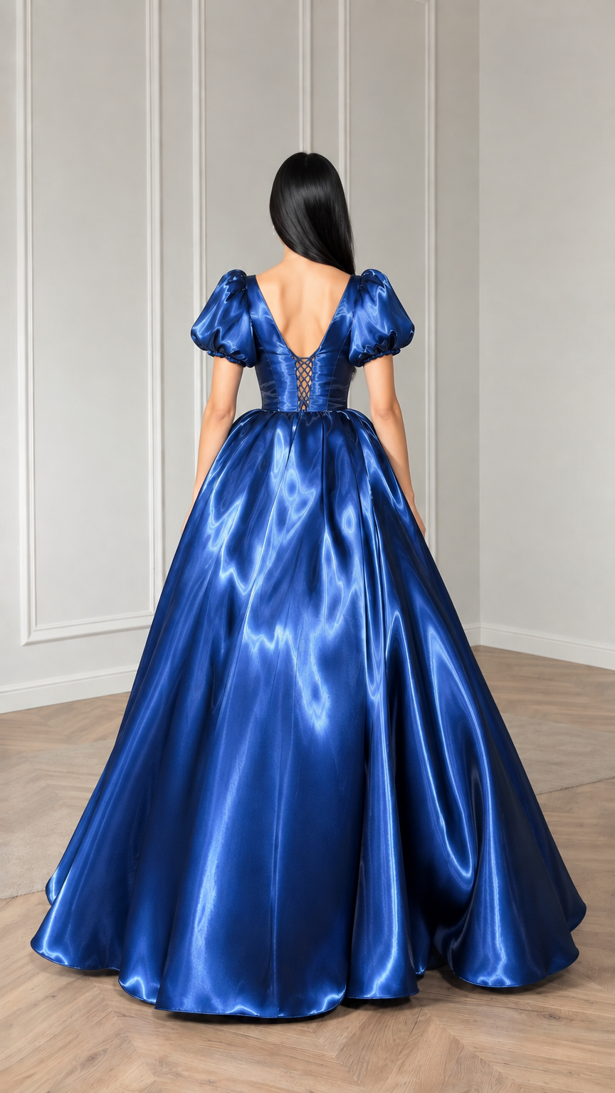 Back view of royal blue ball gown highlighting the lace-up corset back