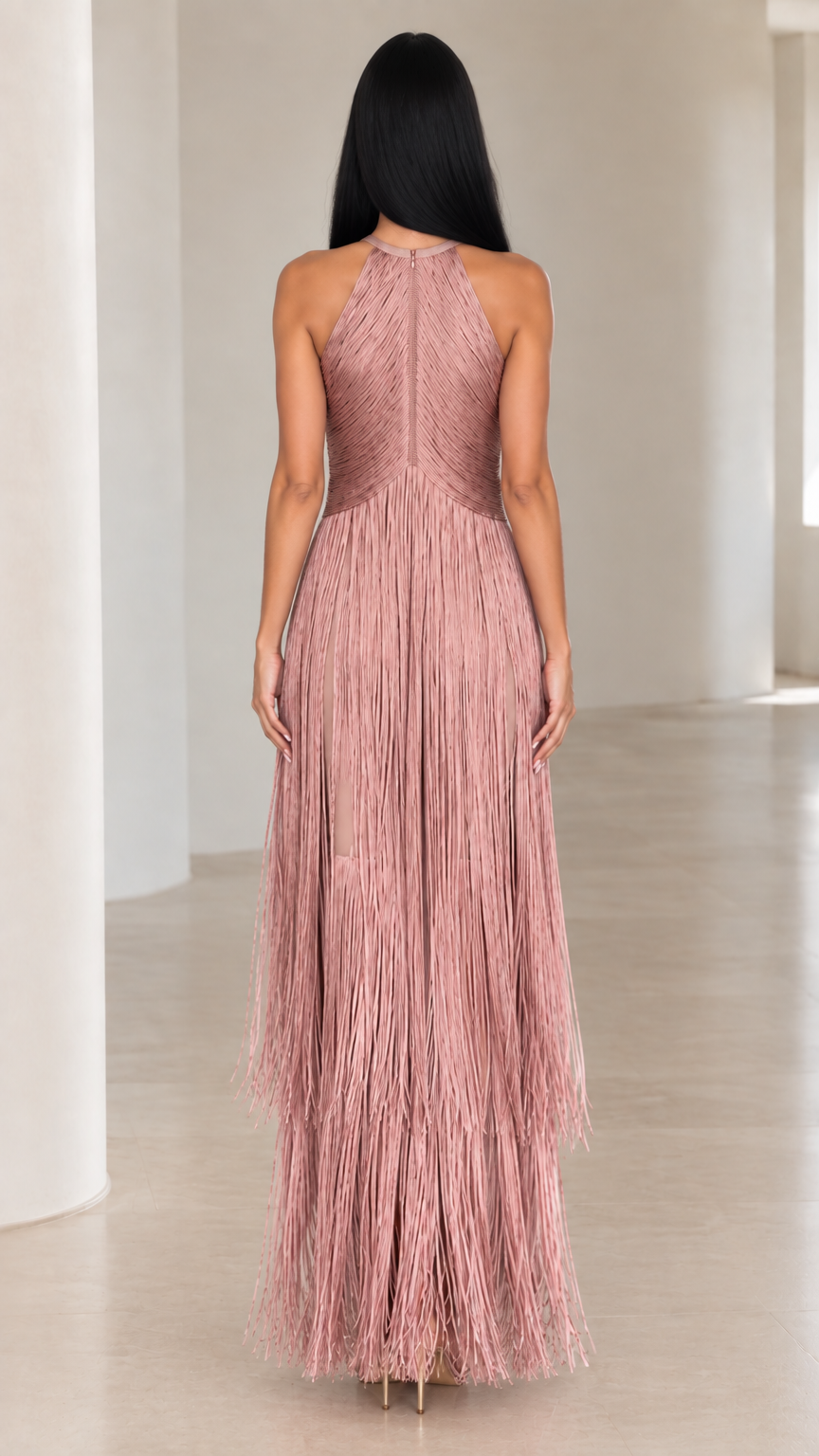 Back view of woman showing high neckline and back zipper on dusty rose fringe dress