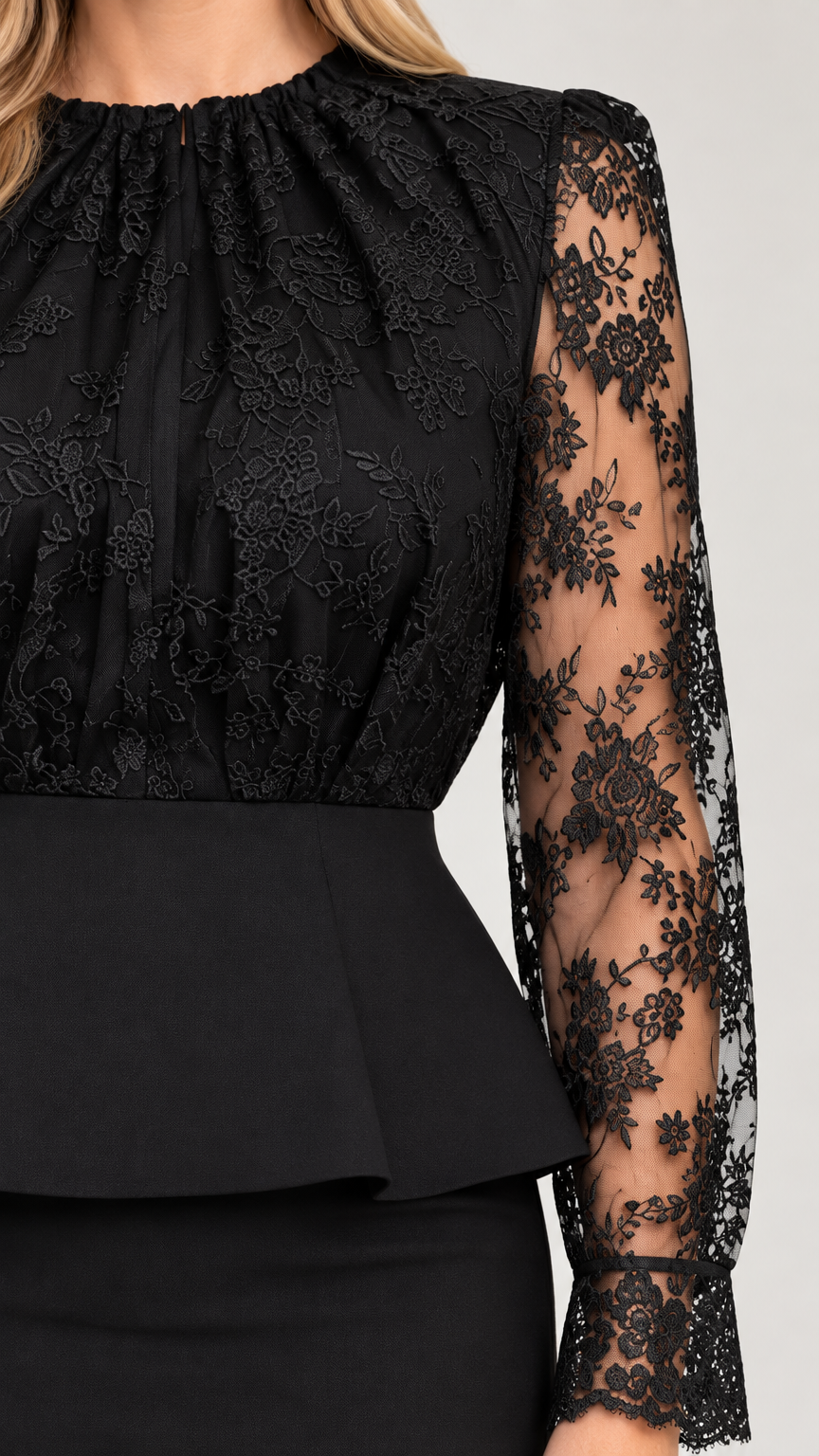 Close-up detail of gathered neckline, floral lace bodice, and peplum waist