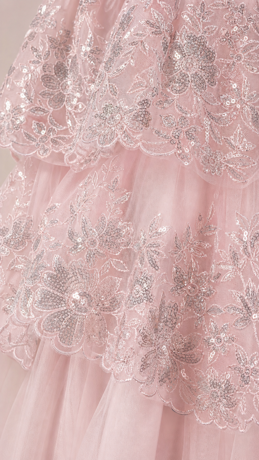 Detailed Close-Up of Blush Pink Sequin Floral Embroidery on Tulle Tiers