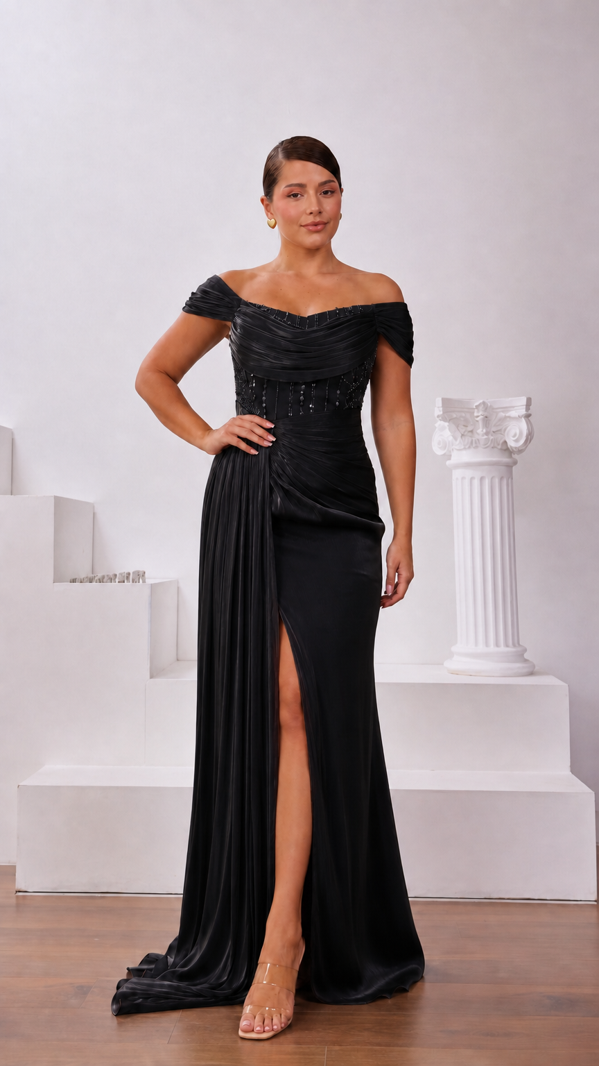 Black off-the-shoulder pleated evening gown with front slit and beaded waist