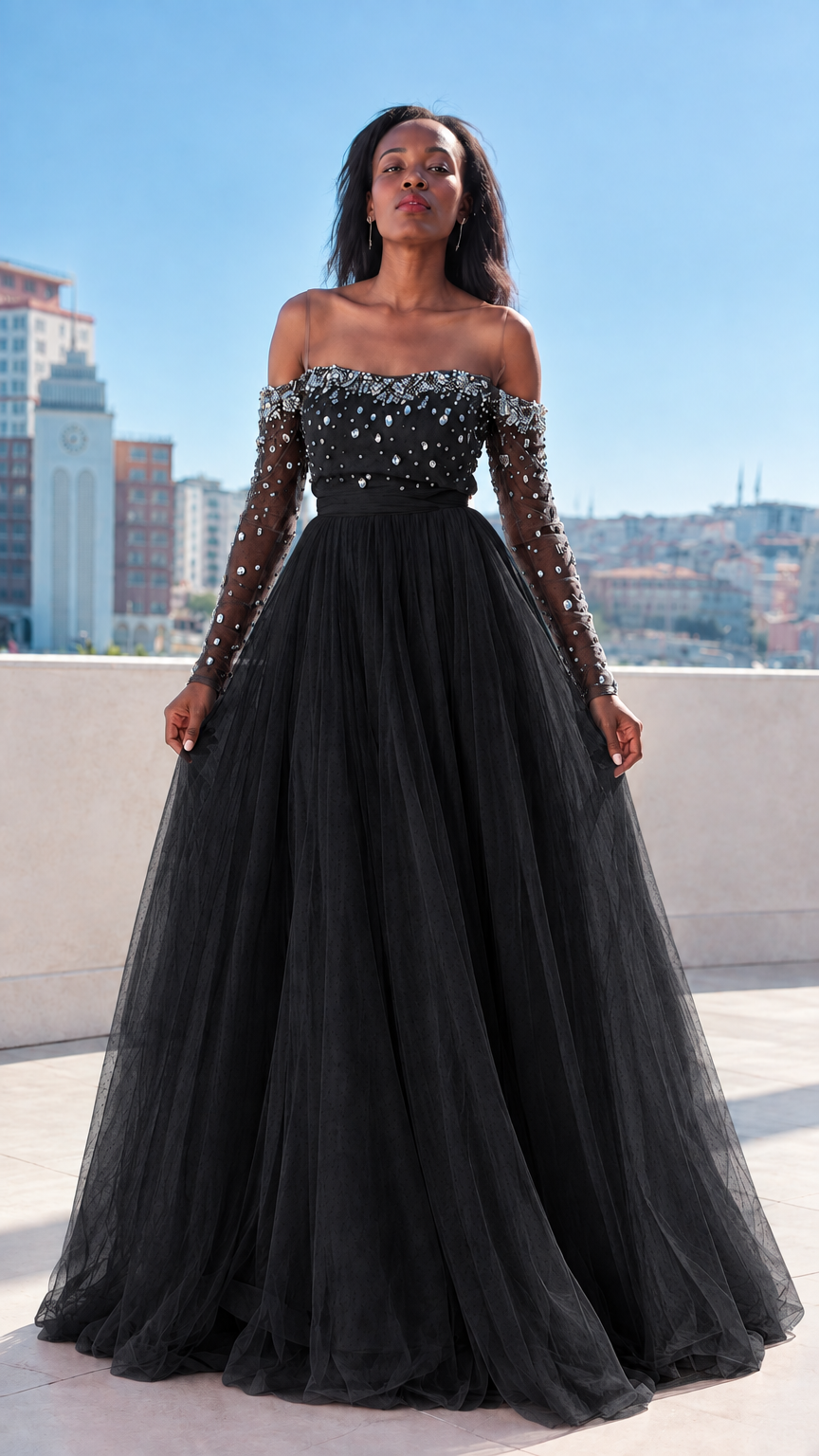 Front full-length view of black rhinestone off-the-shoulder tulle ball gown