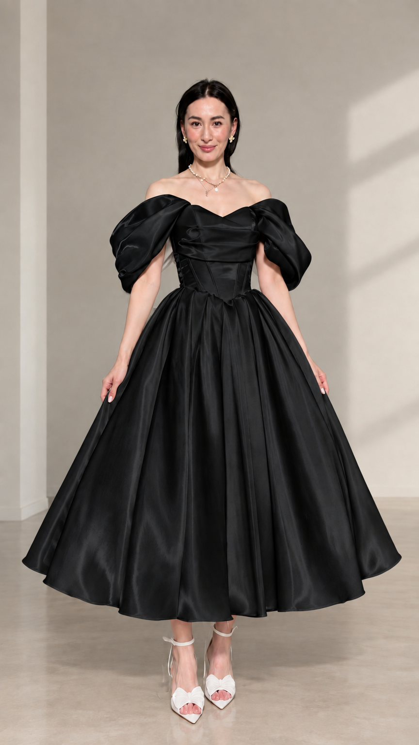 Front view of black off-the-shoulder corset satin midi dress with puff sleeves