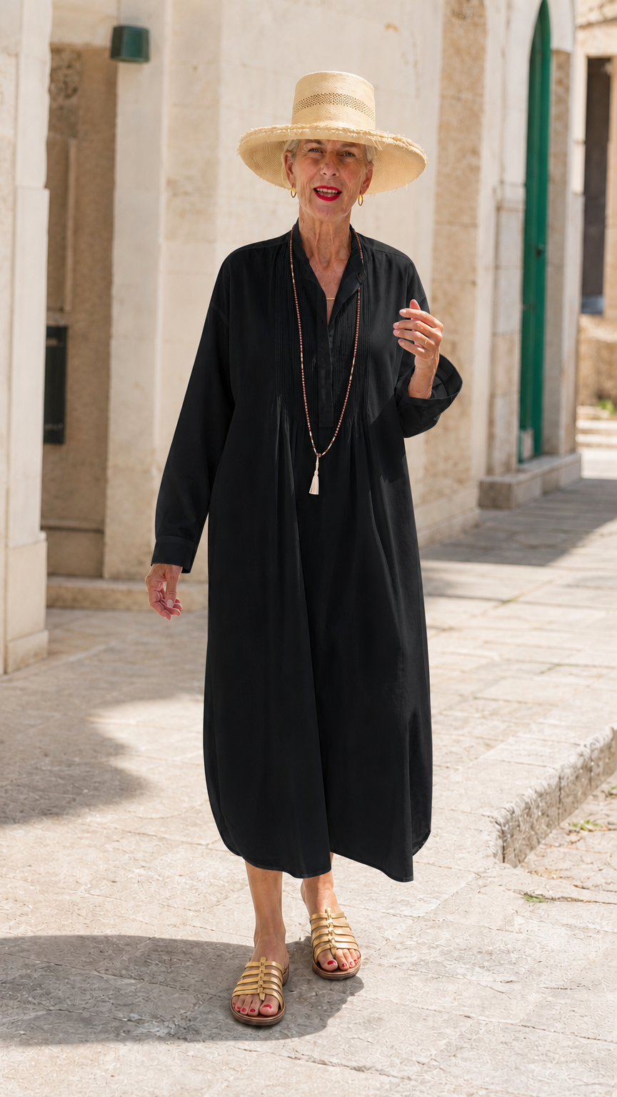 Black long sleeve pintuck midi shirt dress modeled on street