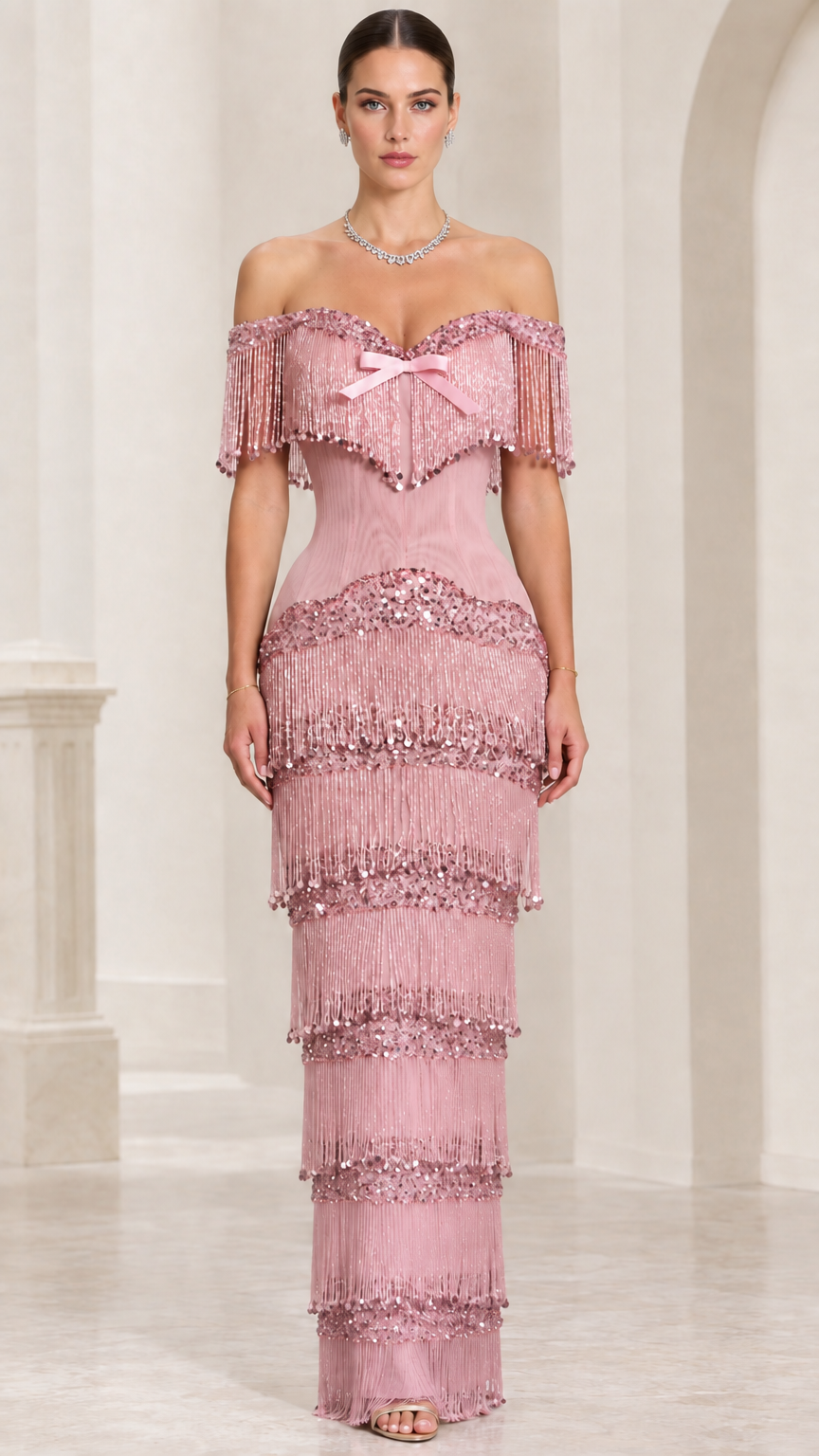 Model wearing dusty pink off-shoulder tiered fringe sequin formal gown