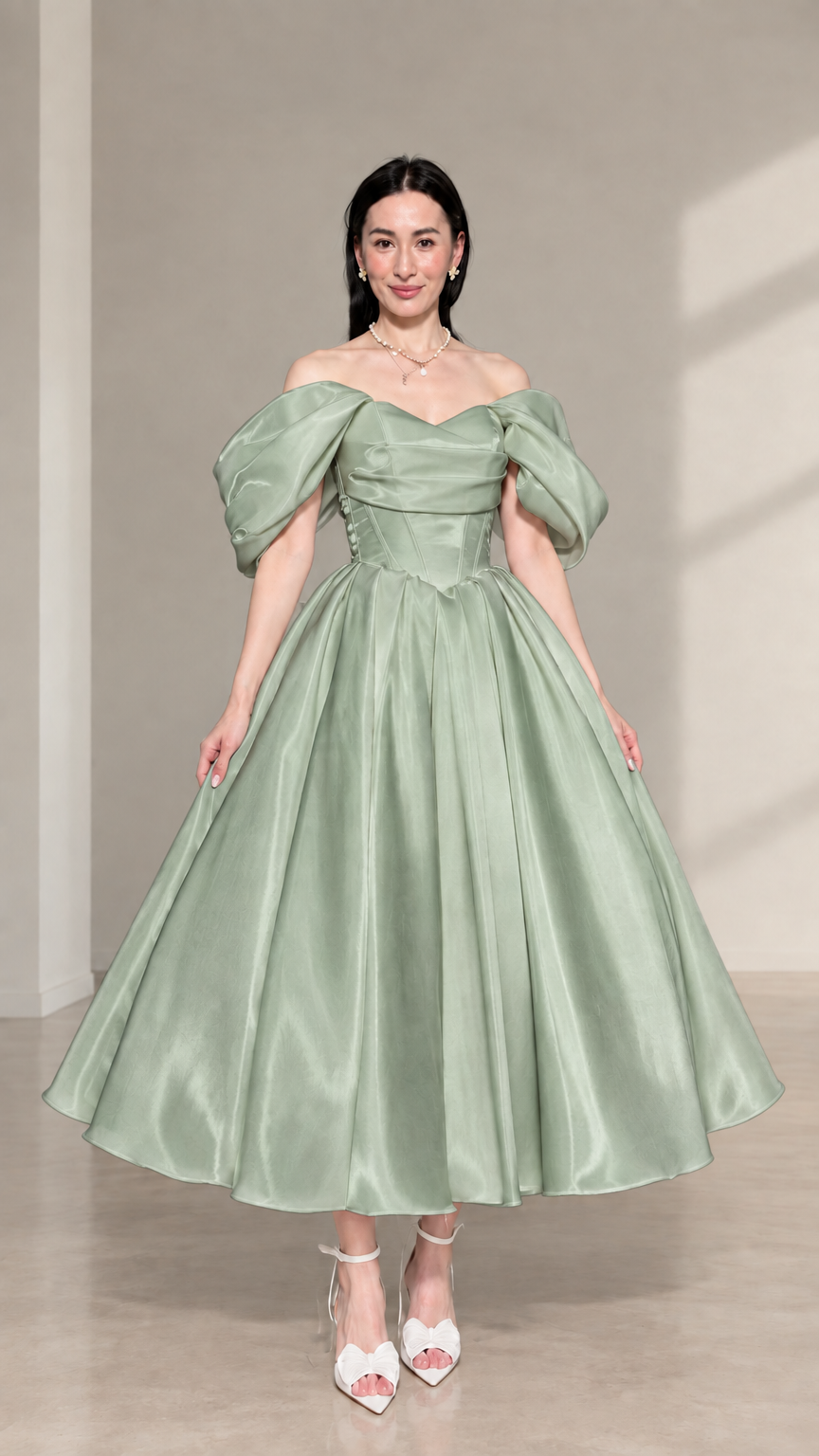 Front view of sage green off-the-shoulder corset satin midi dress with puff sleeves