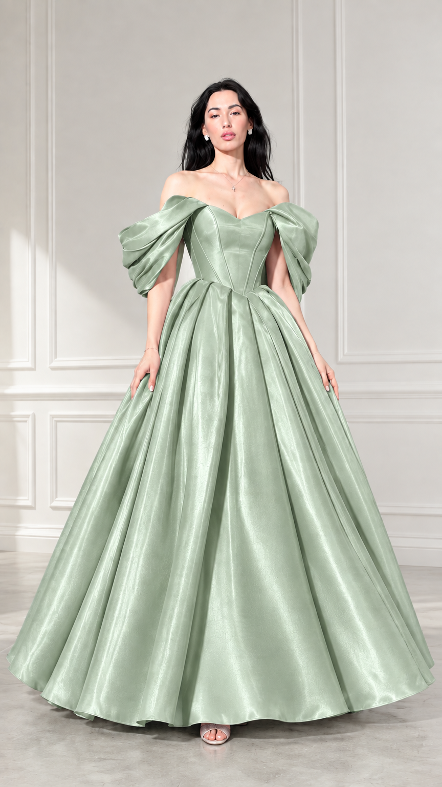 Front view of woman wearing sage green off-the-shoulder satin ball gown
