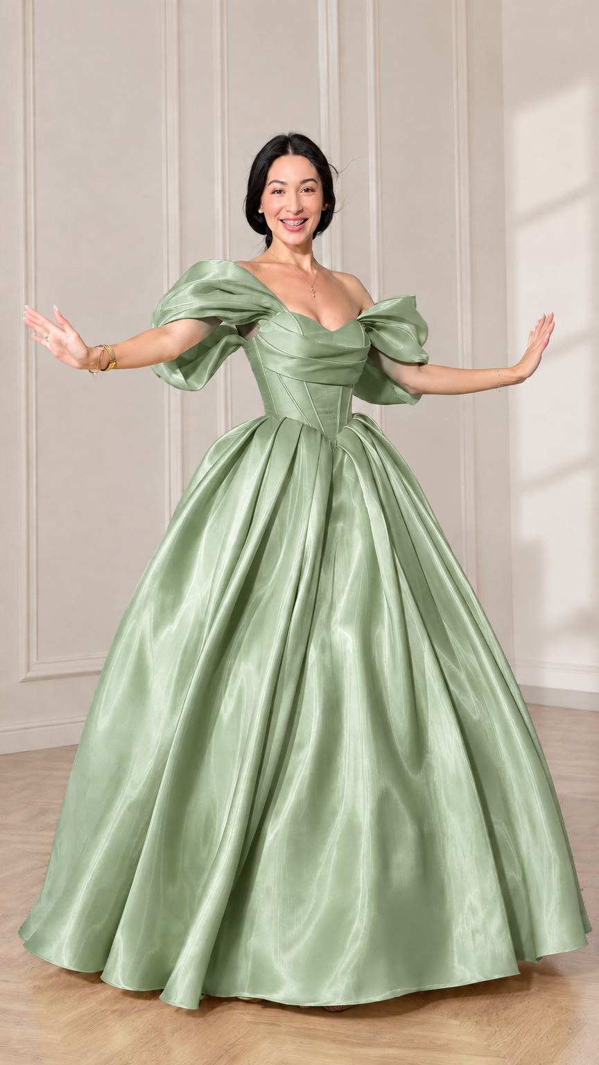 Front view of model wearing a sage green off-shoulder puff sleeve corset ball gown