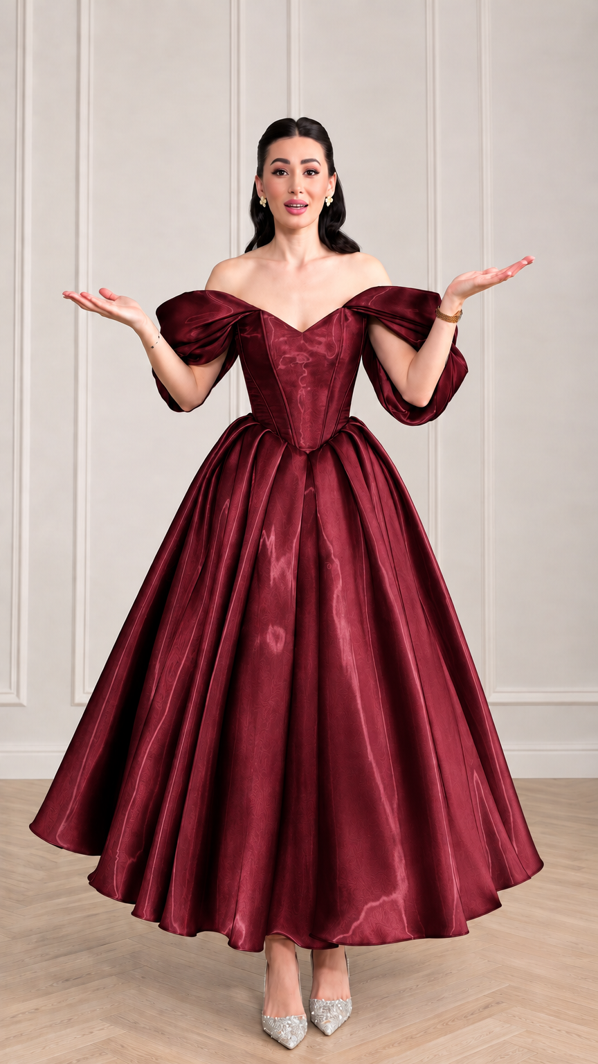 Woman wearing burgundy wine red corset satin ball gown with sweetheart neckline