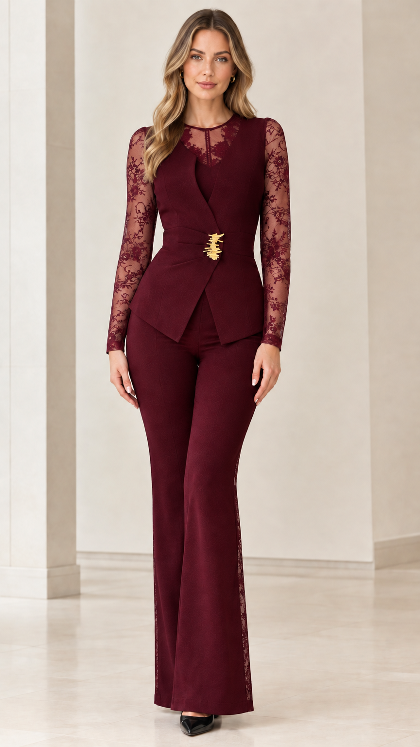 Front view of burgundy wine two-piece suit set with sheer lace sleeves and flared trousers