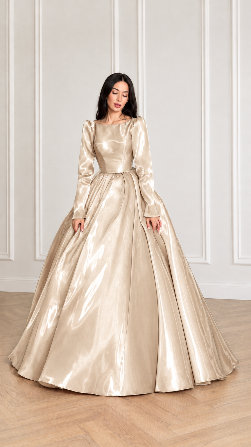 Front view of model wearing champagne gold glossy long sleeve satin ball gown