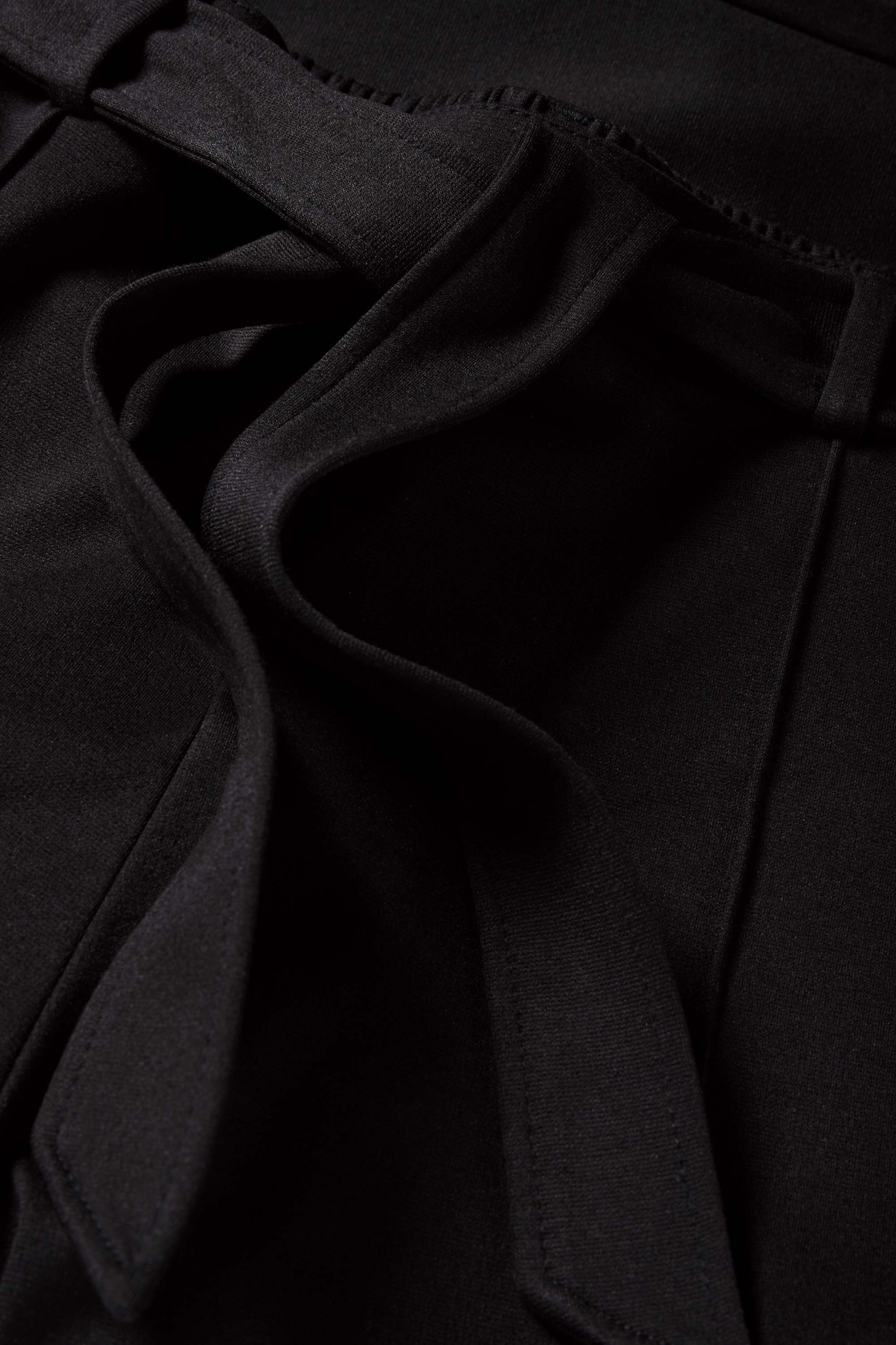 Jersey trousers - mid-rise waist - flared fit black