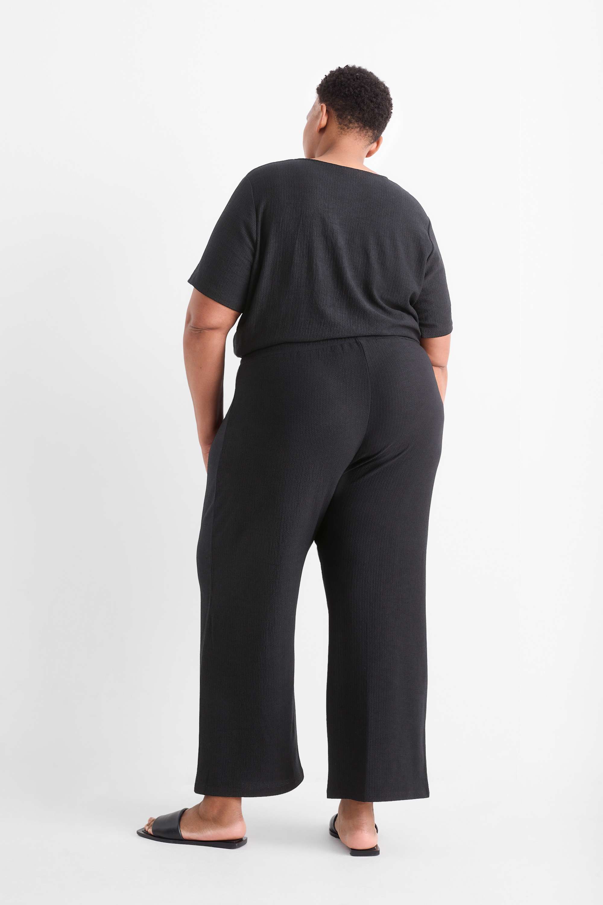 Jersey trousers - mid-rise waist - wide leg - textured black (1)