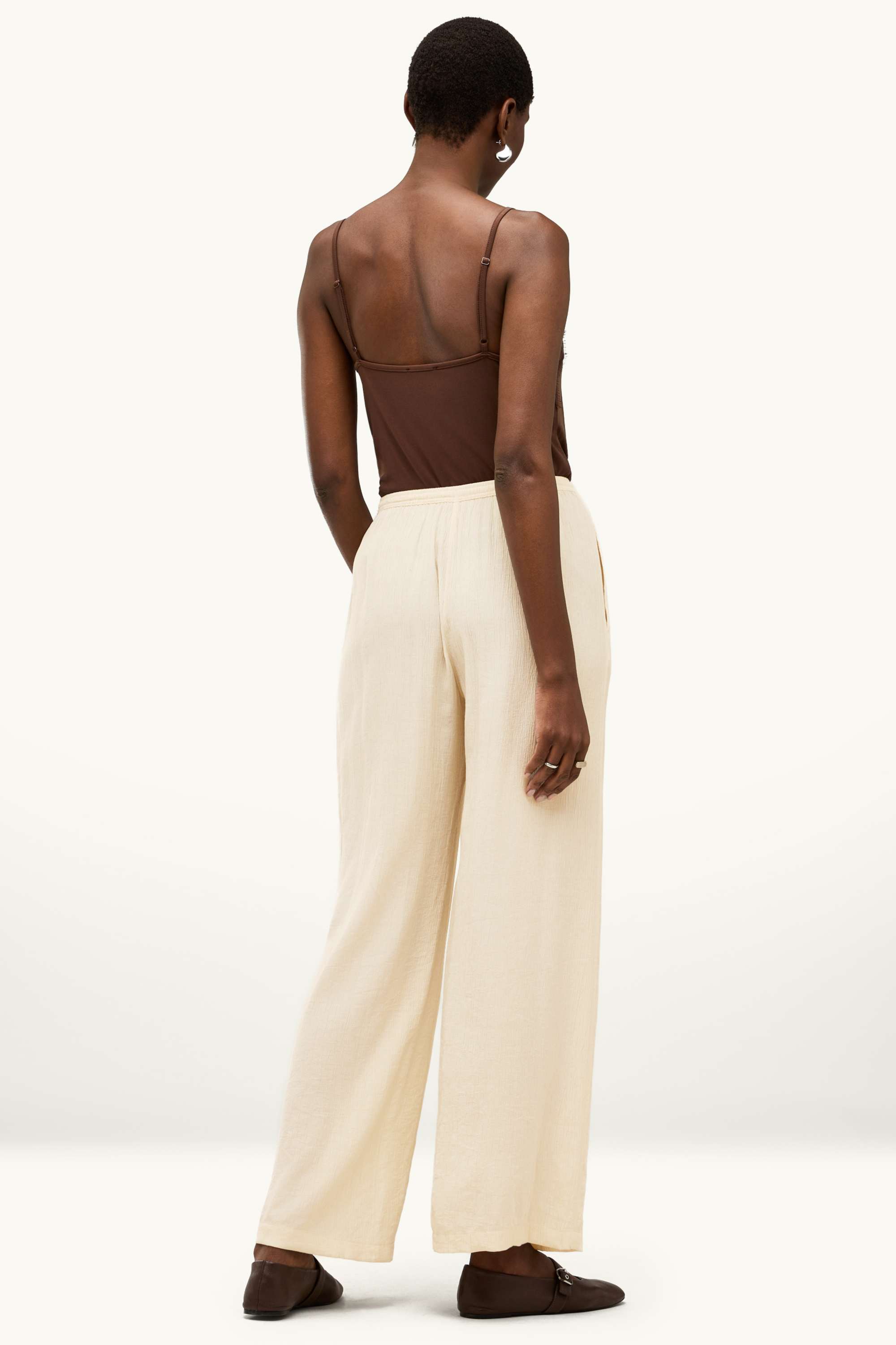 Cloth trousers - mid-rise waist - wide leg creme