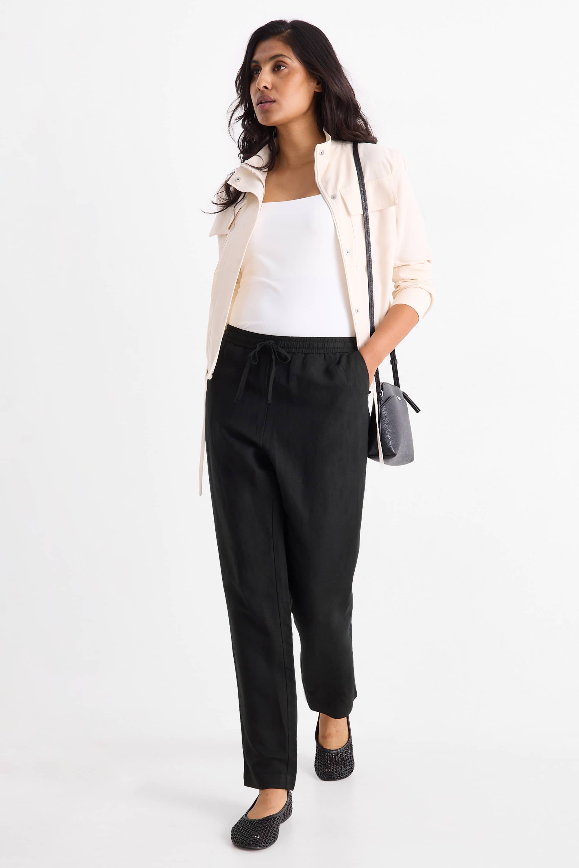 Cloth trousers - mid-rise waist - tapered fit - linen blend black