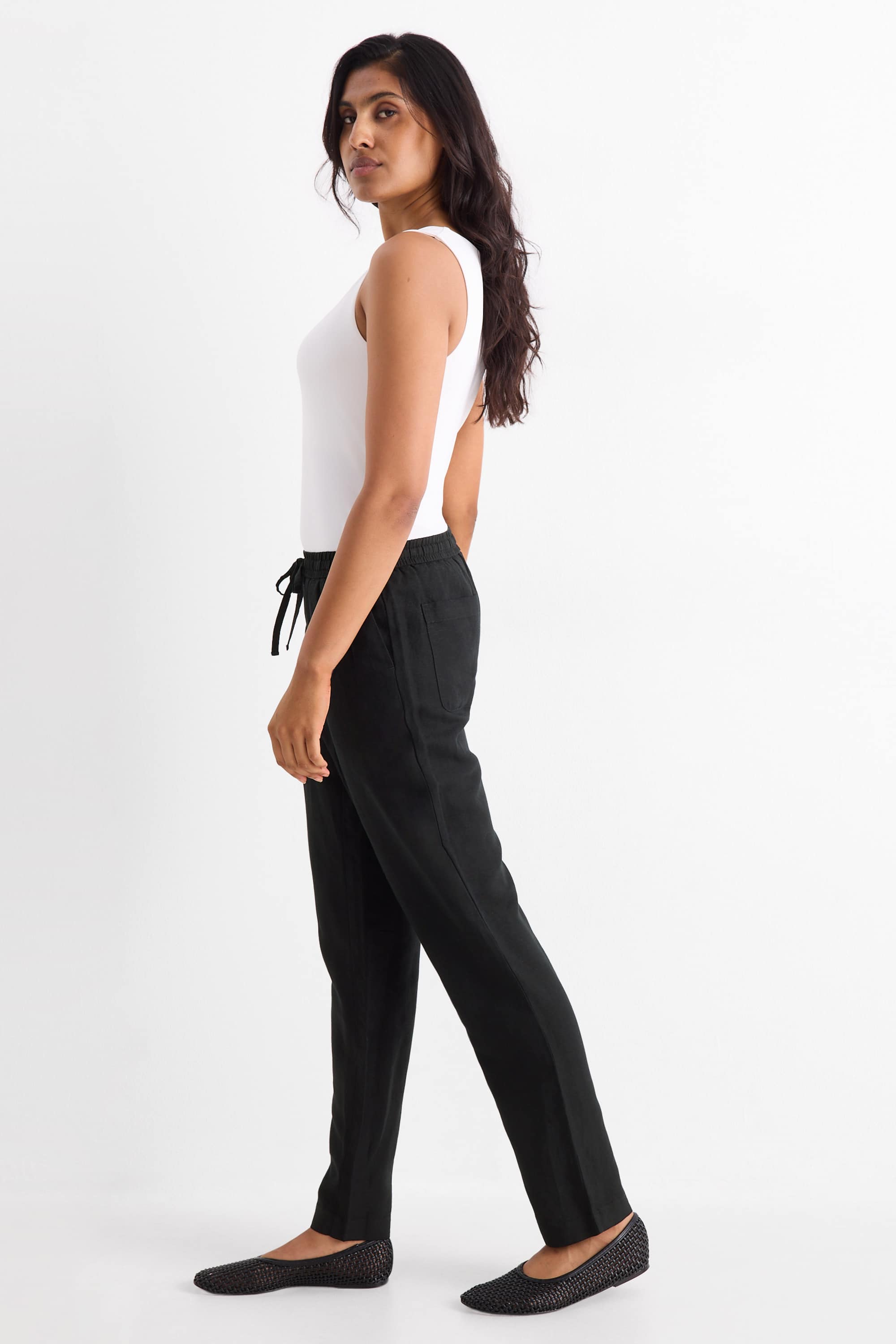 Cloth trousers - mid-rise waist - tapered fit - linen blend black
