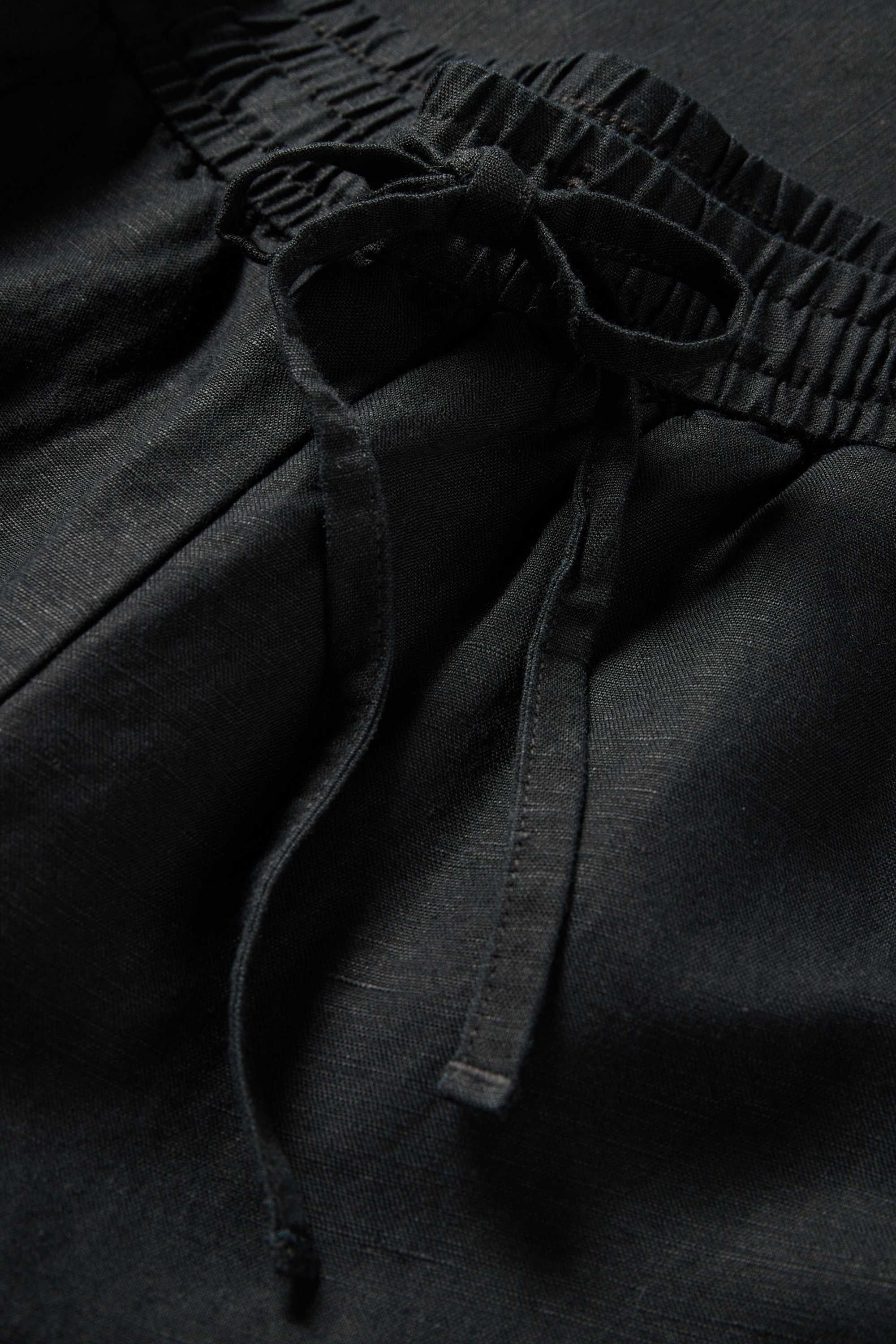 Cloth trousers - mid-rise waist - tapered fit - linen blend black