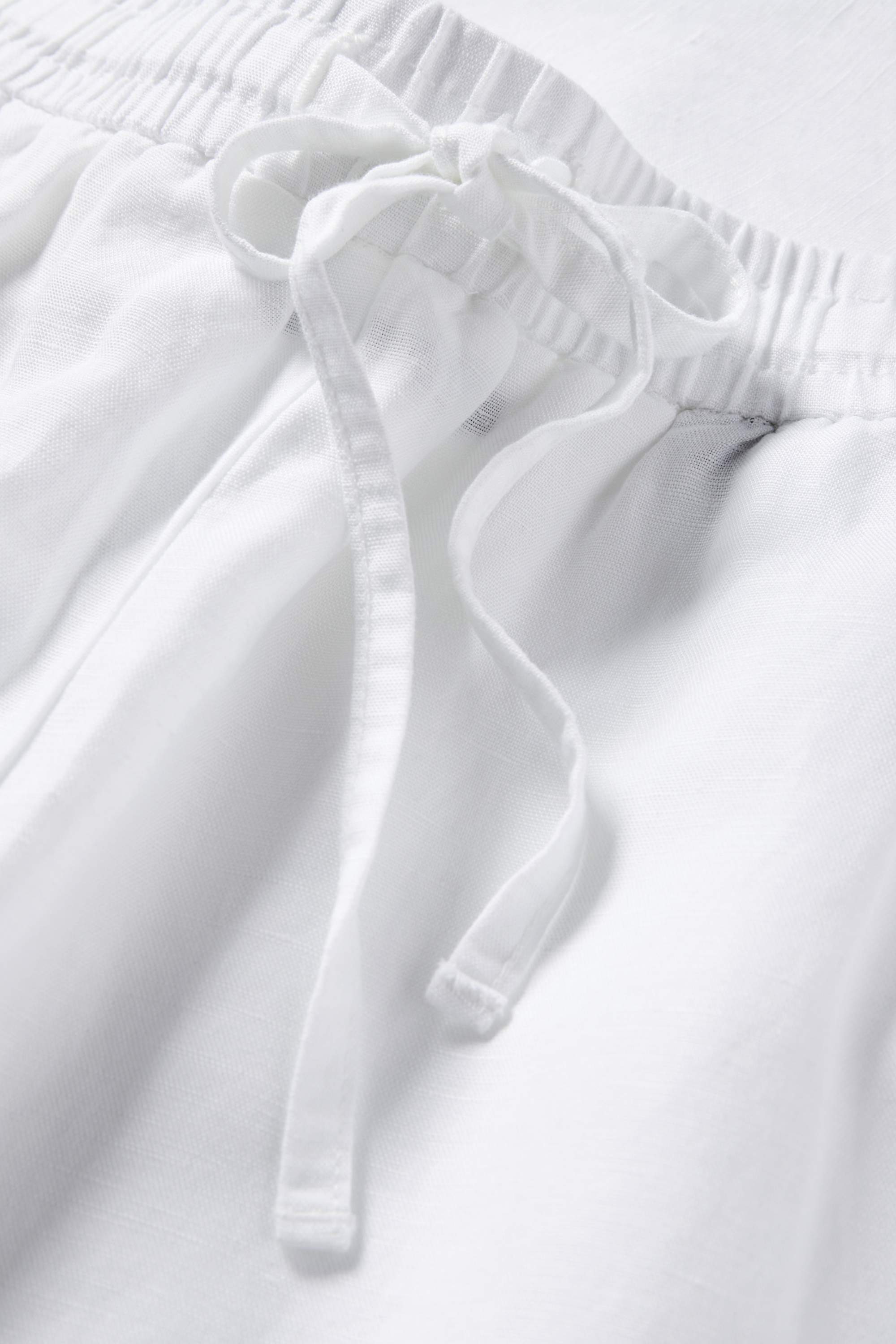 Cloth trousers - mid-rise waist - tapered fit - linen blend white