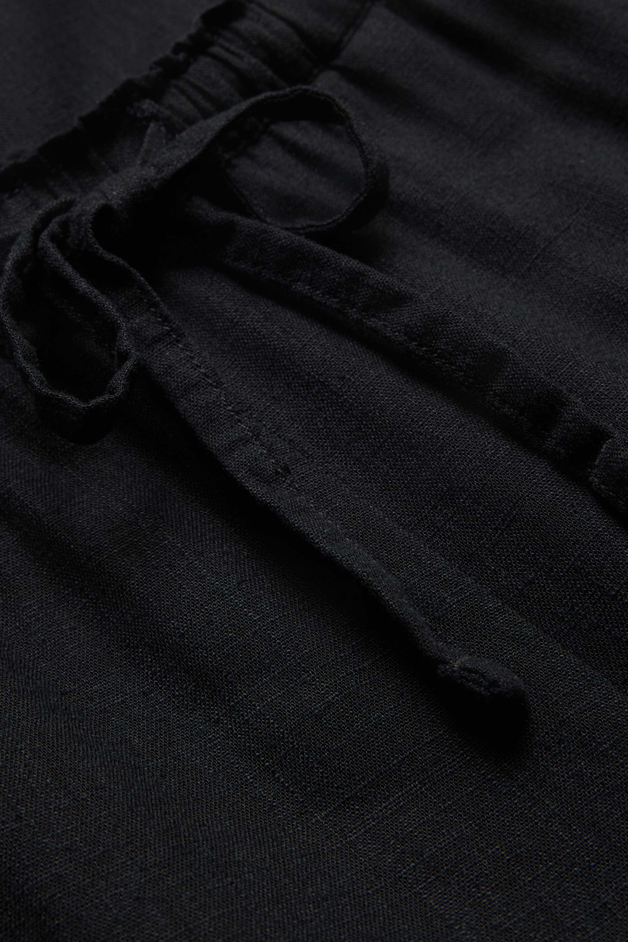 Cloth trousers with linen content - mid-rise waist - loose fit black