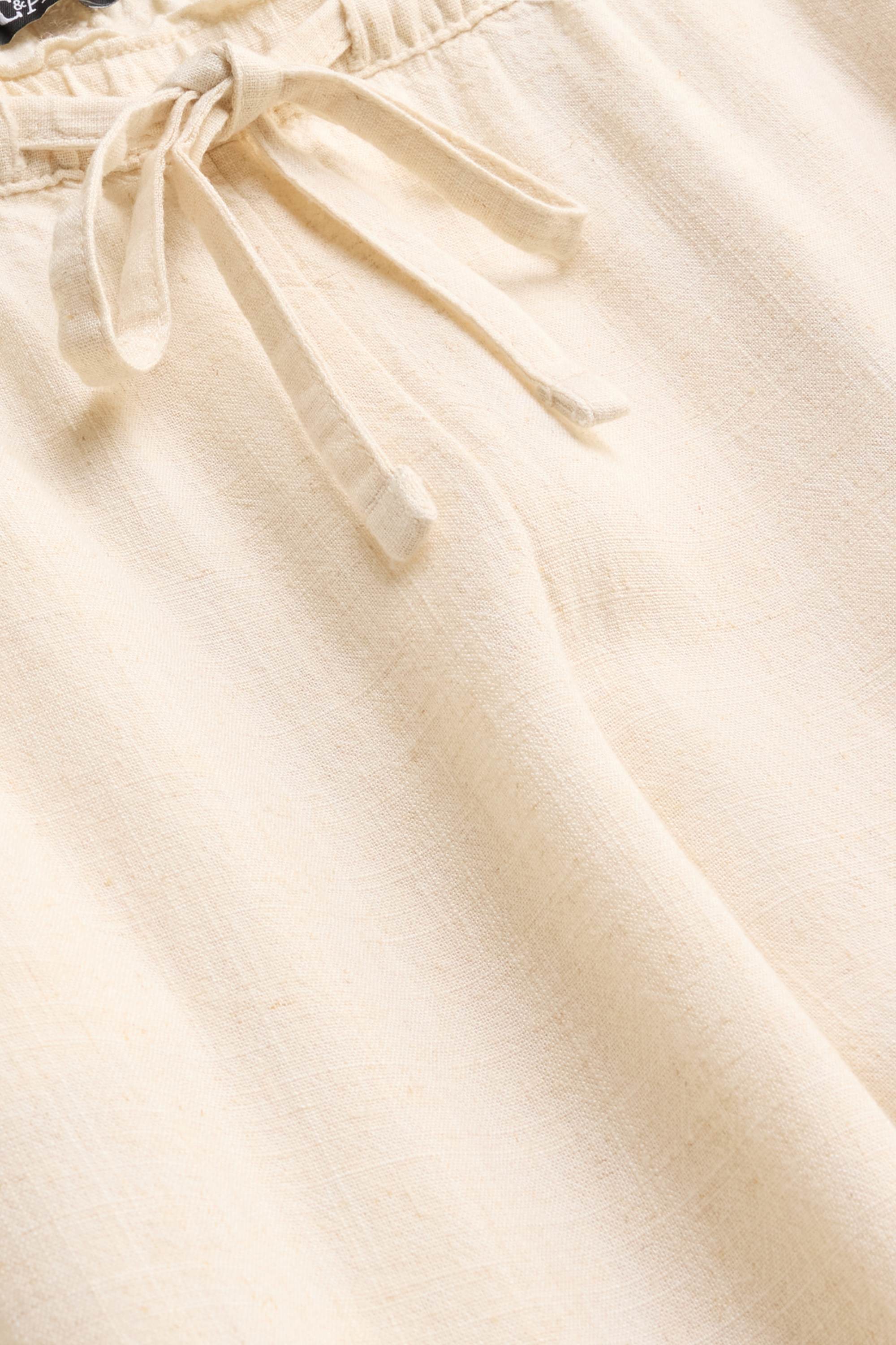 Cloth trousers with linen content - mid-rise waist - loose fit creme
