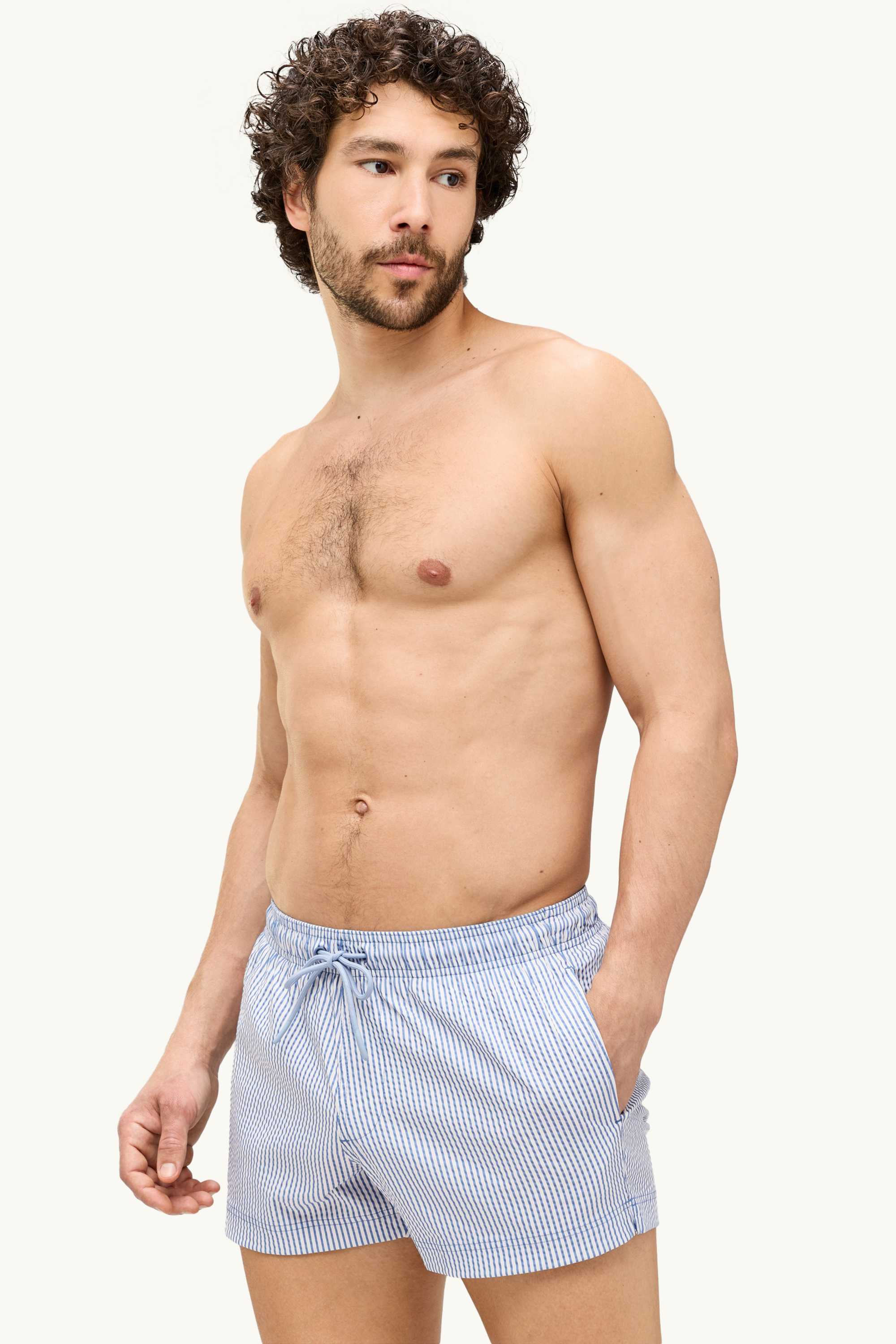 Swim shorts - textured blue / white