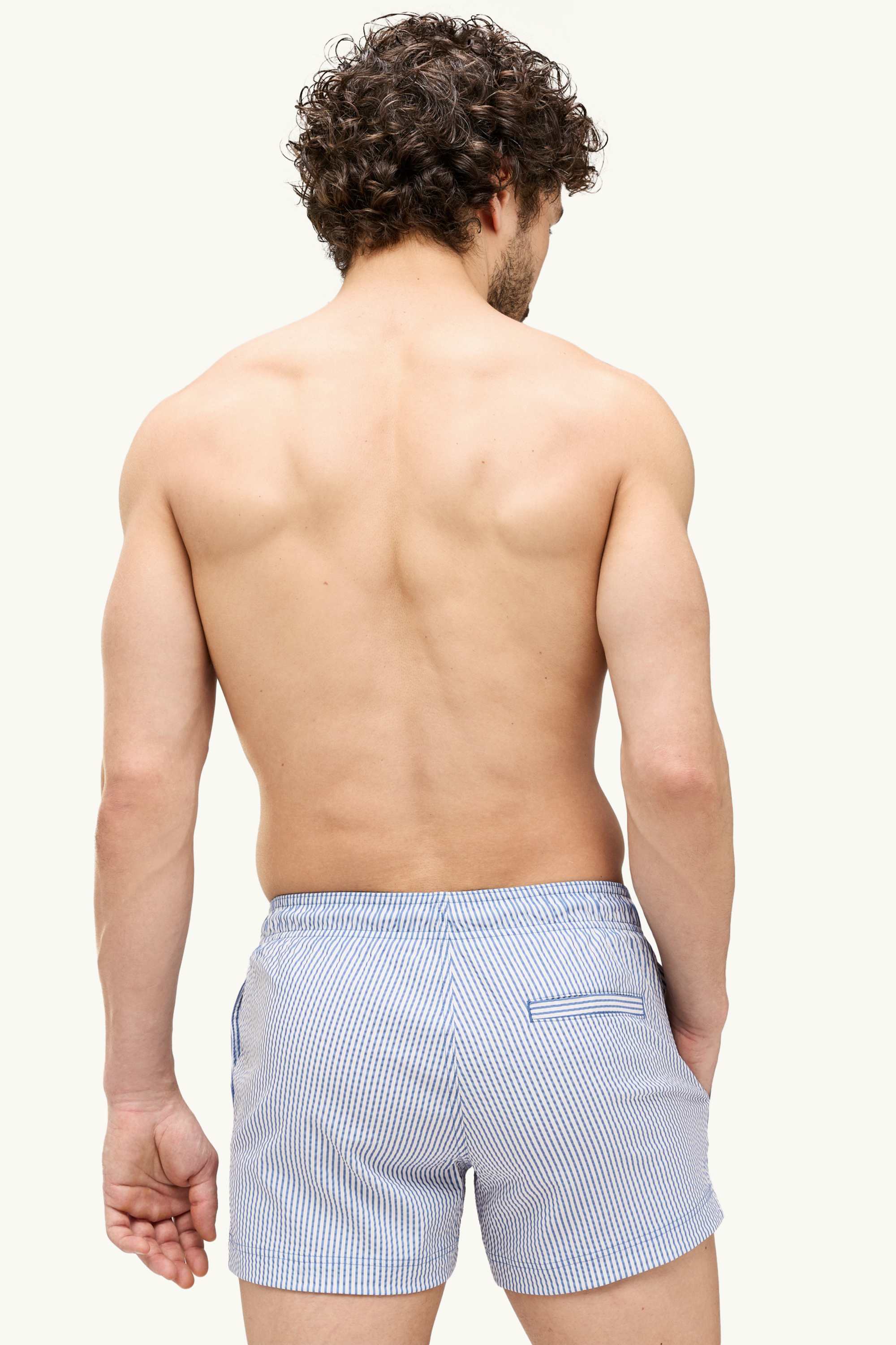 Swim shorts - textured blue / white