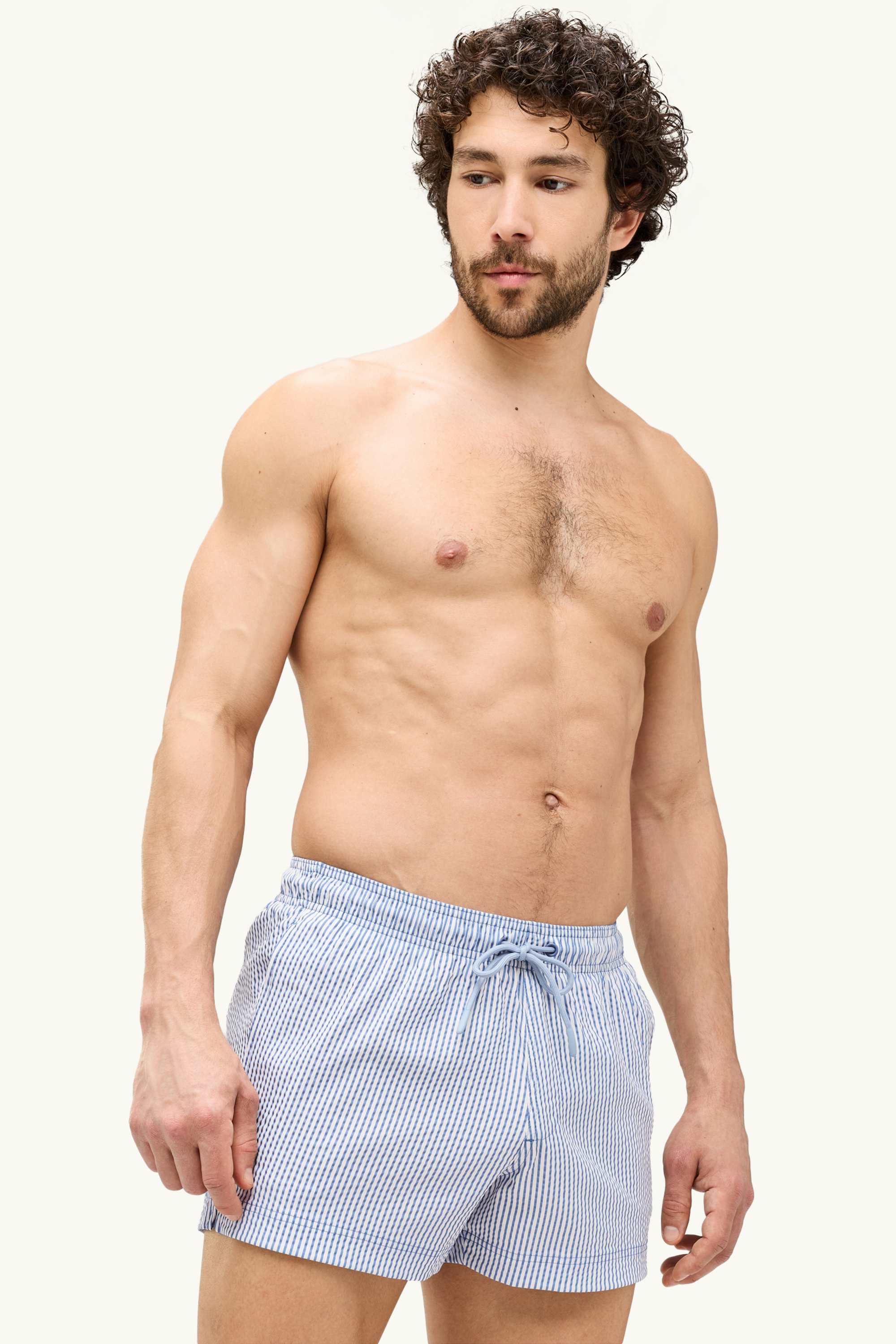Swim shorts - textured blue / white